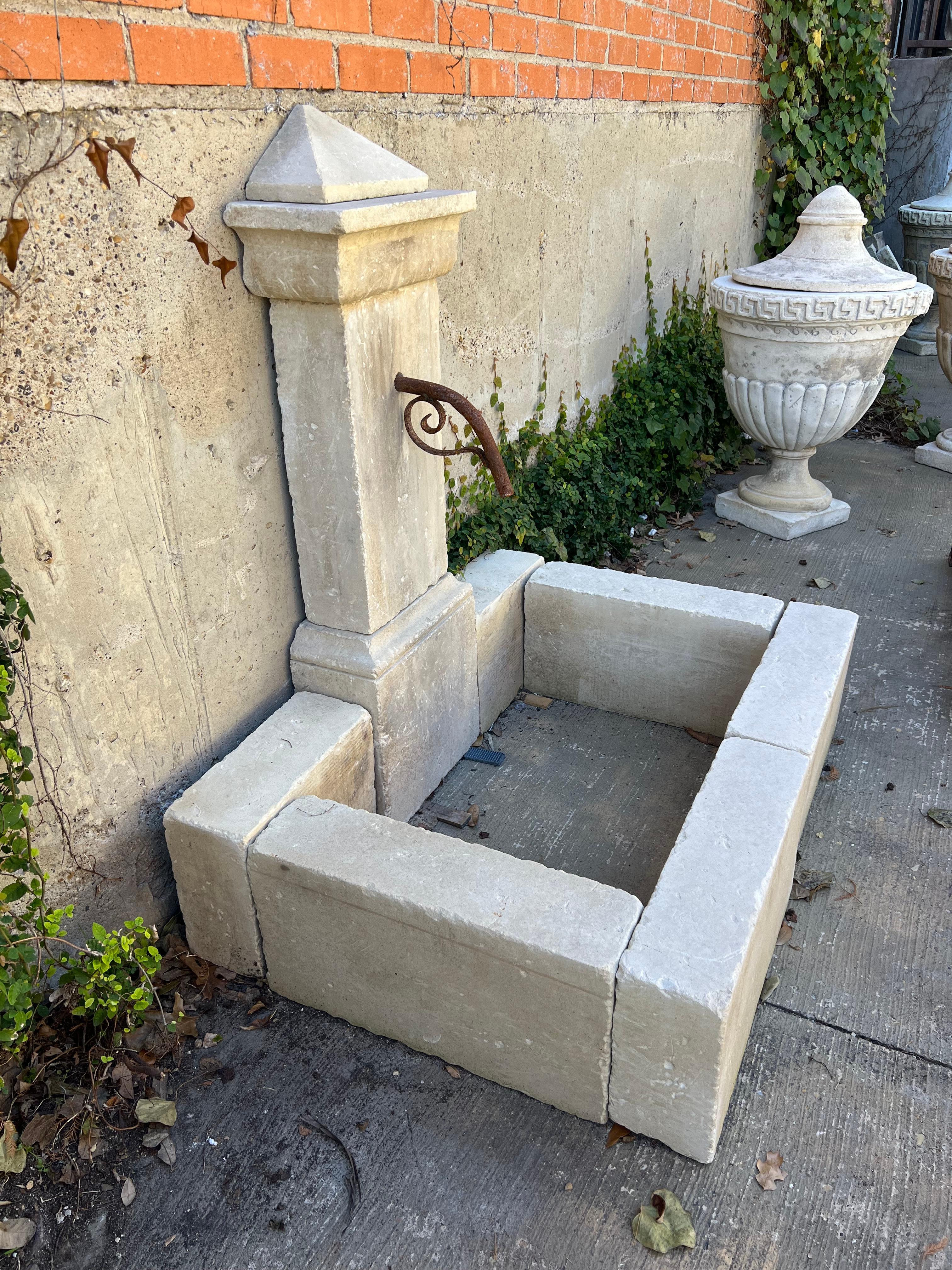 Hand-Carved Single Pillar Carved Limestone Wall Fountain From Southern Italy For Sale