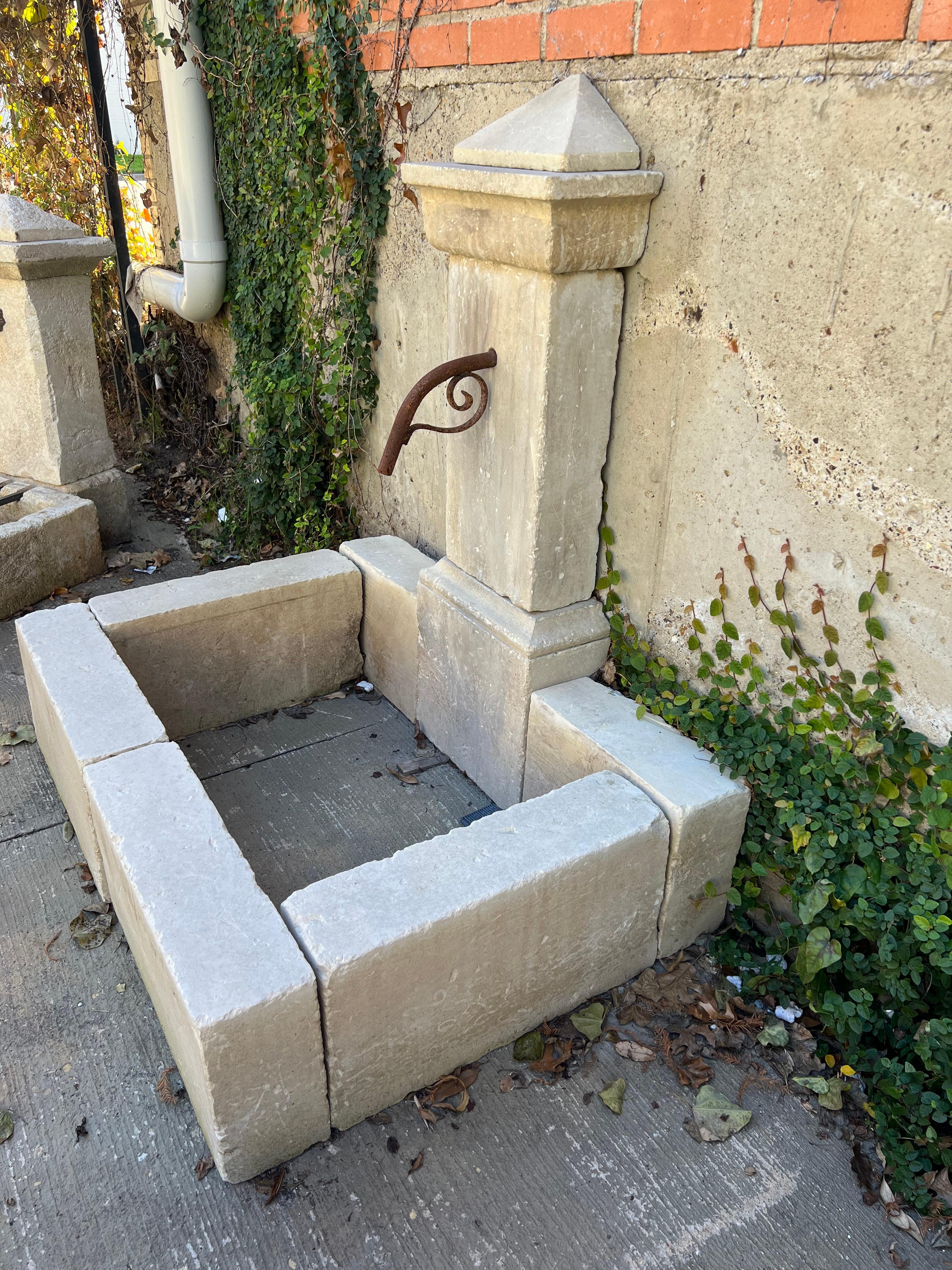 Contemporary Single Pillar Carved Limestone Wall Fountain From Southern Italy For Sale