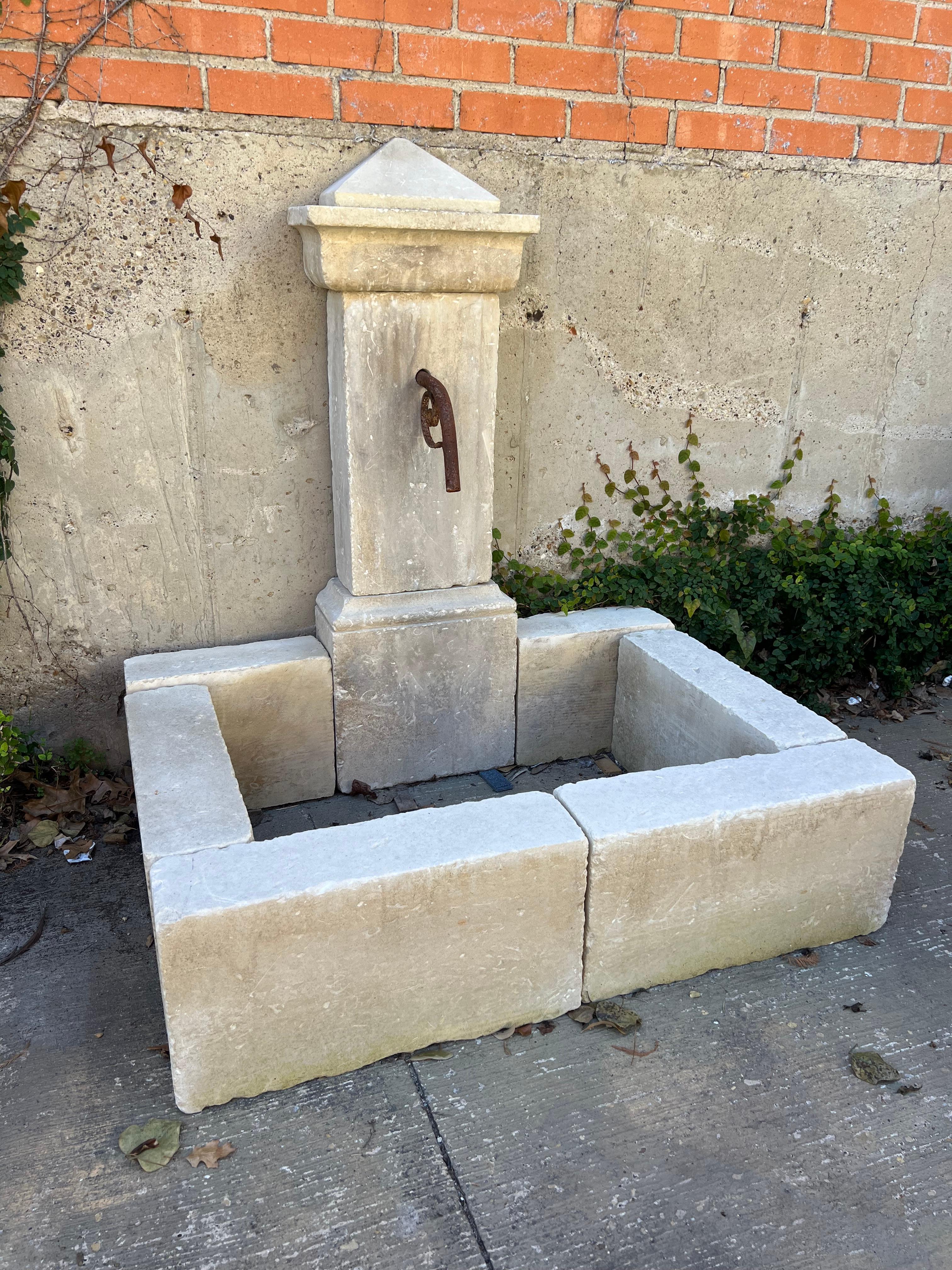 Single Pillar Carved Limestone Wall Fountain From Southern Italy For Sale 1