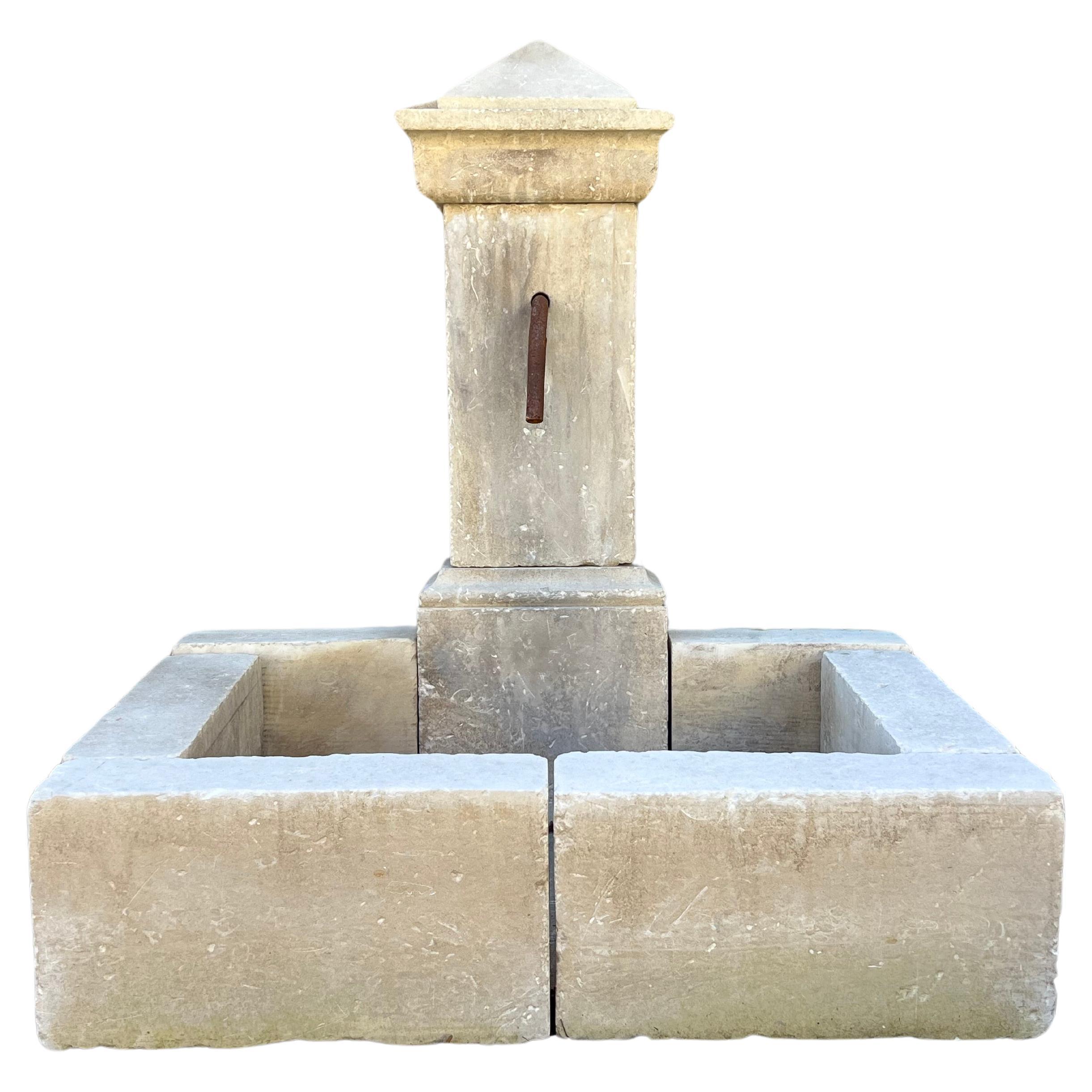 Single Pillar Carved Limestone Wall Fountain From Southern Italy For Sale