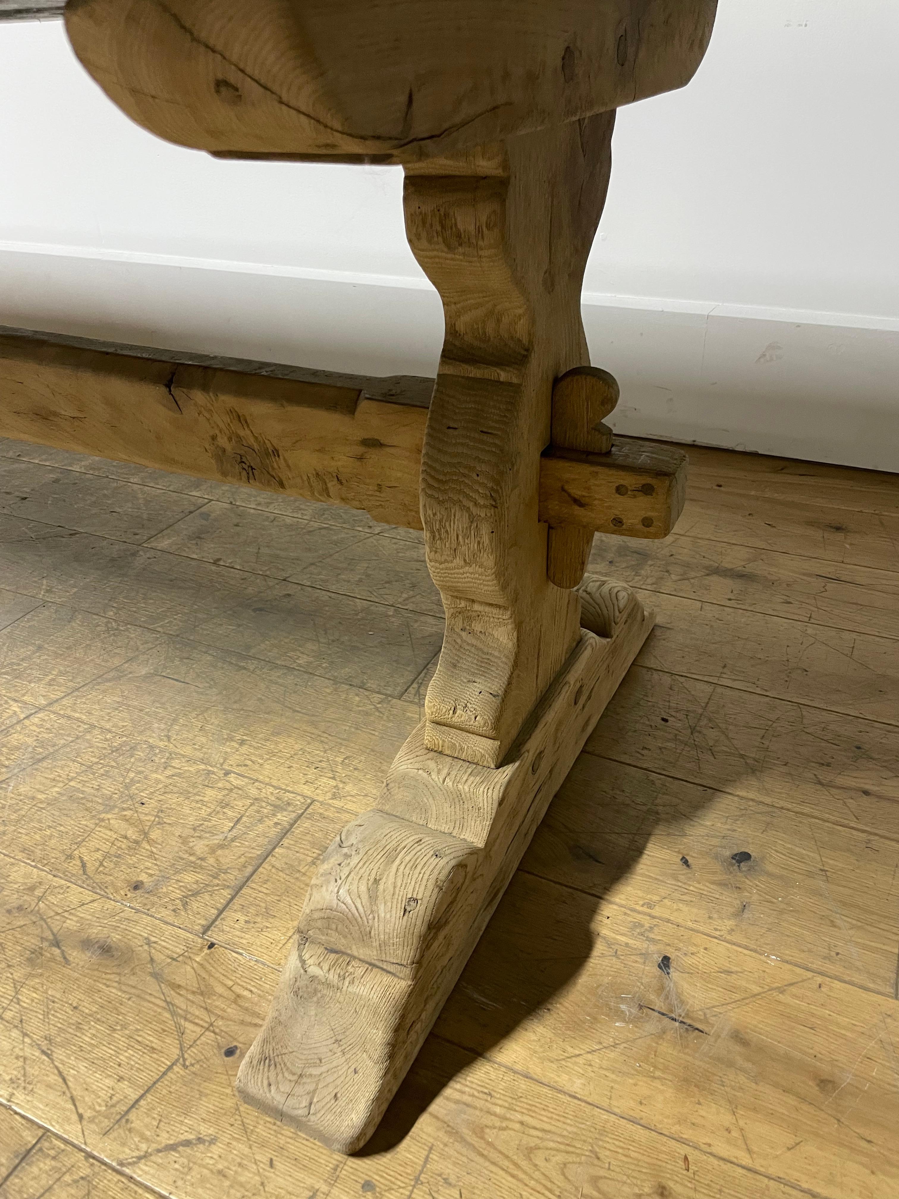 Stunning example of an early 20th century scrubbed oak refectory table 

French circa 1920’s constructed from solid oak , wonderful single planked top 

This table has been washed and scrubbed to give it a contemporary feel , we do not use harsh