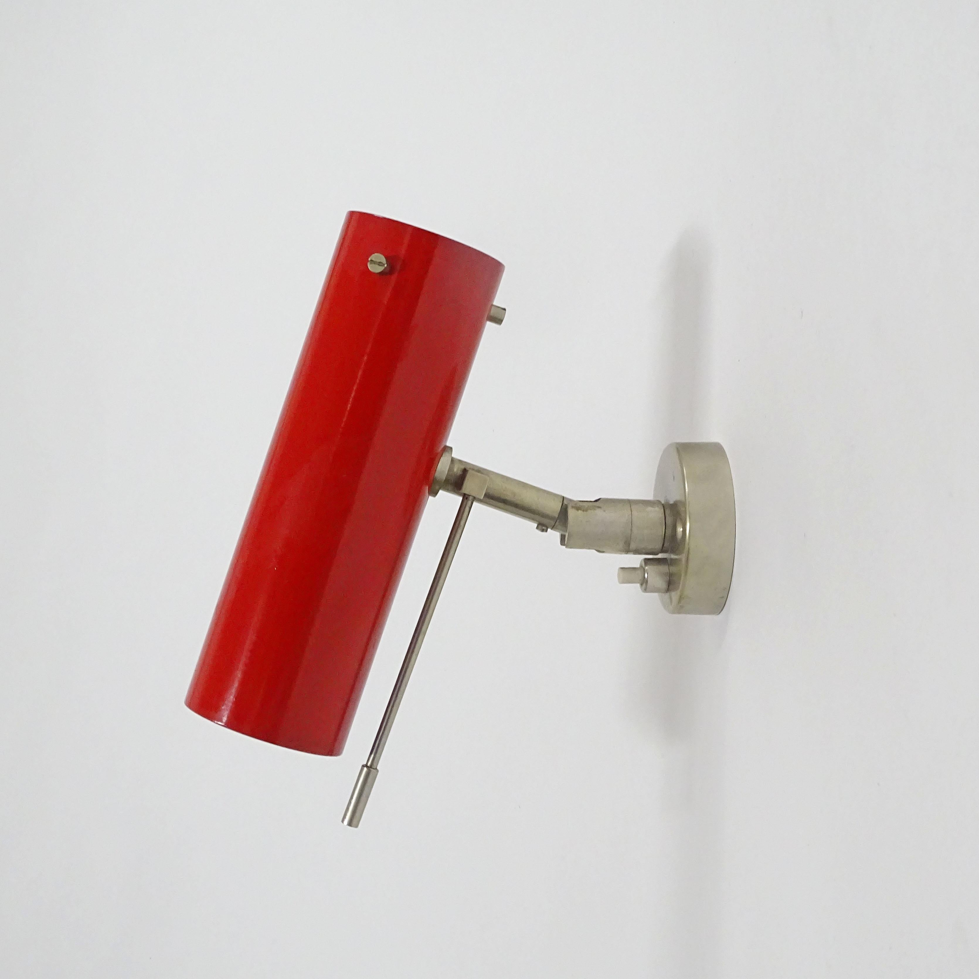 Splendid single red and nickel wall light by Tito Agnoli for Oluce, Italy 1950s