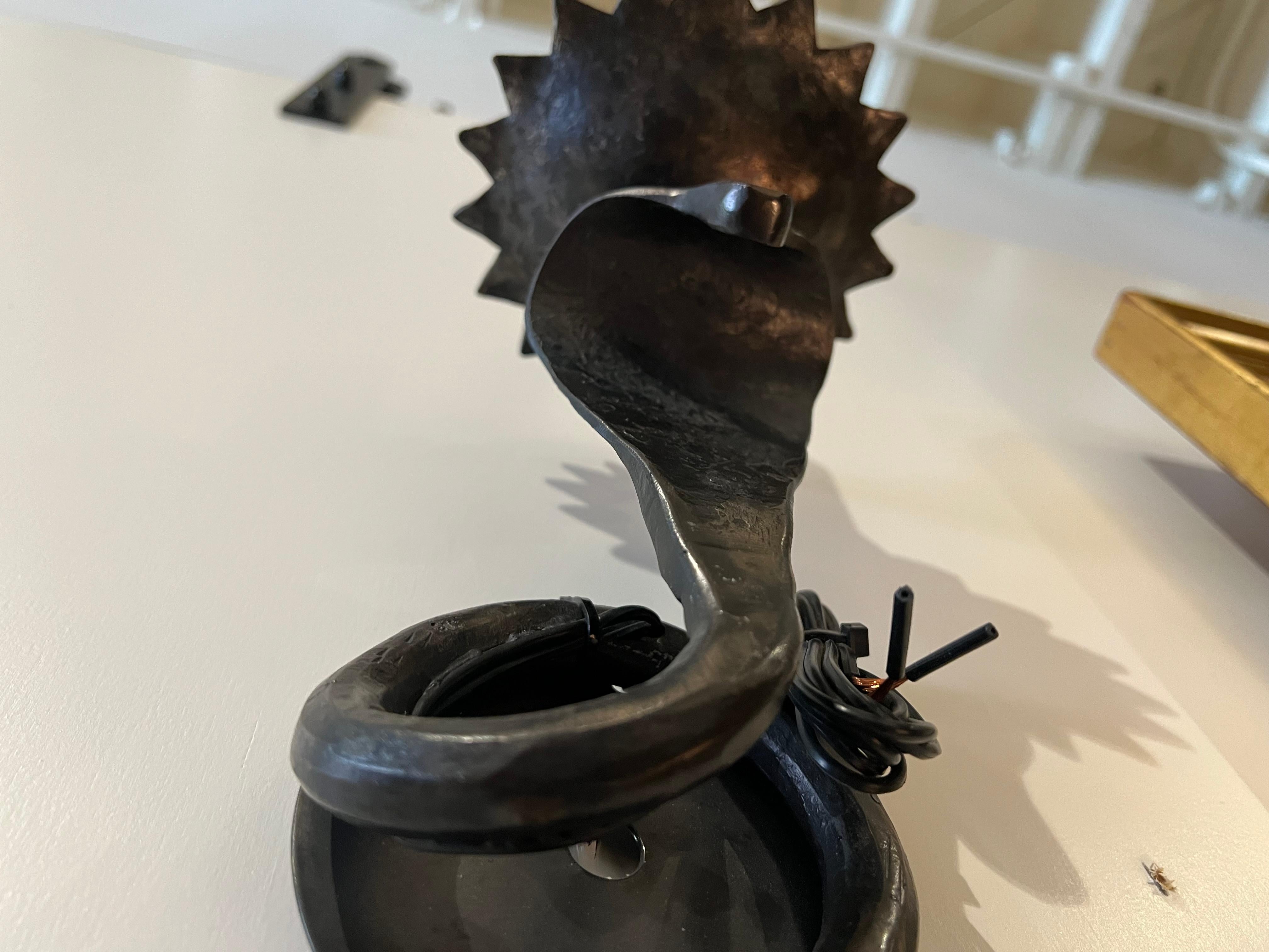Iron Single Electrified Serpent Sconce in gunmetal wrought iron finish For Sale