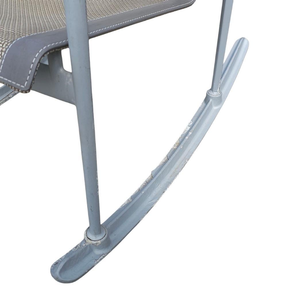 A true design icon, this 1966 Collection Rocker by Richard Schultz brings timeless modernist elegance to any outdoor space. Originally designed for Florence Knoll and reproduced in the 1990s by Richard Schultz Design, this chair features a light