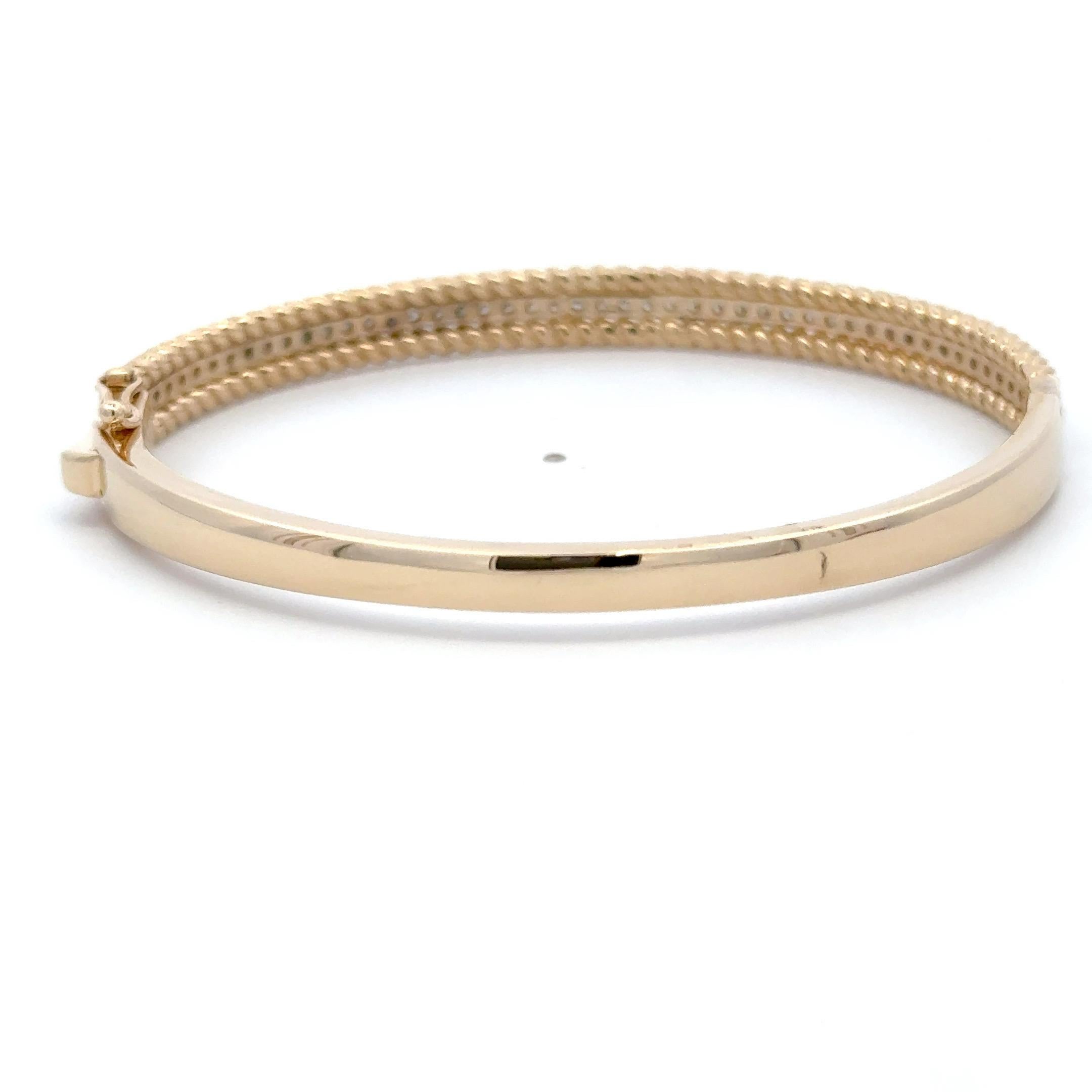 Bracelet jonc torsadé à une rangée de diamants 0,98 carat or jaune 14 carats 18,5 grammes en vente 1