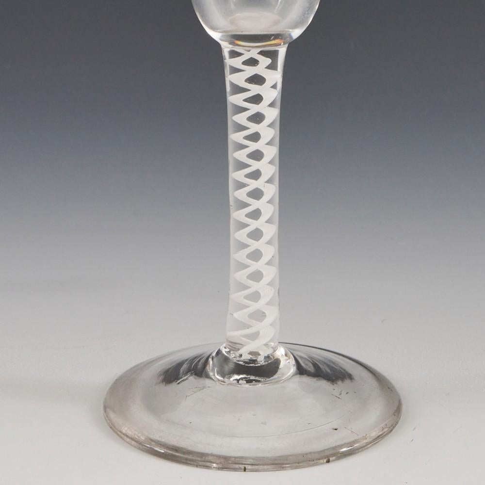 Single Series Opaque Twist Wine Glass, c1760

Additional information:
Period : George II / George III - c1760
Origin : England 
Colour : Clear with grey hue, excellent pucella marks
Bowl : Round funnel 
Stem : Single series opaque twist - a pair of