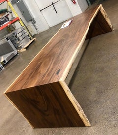Single slab full miter 11ft long monkeypod dining table with raw edge