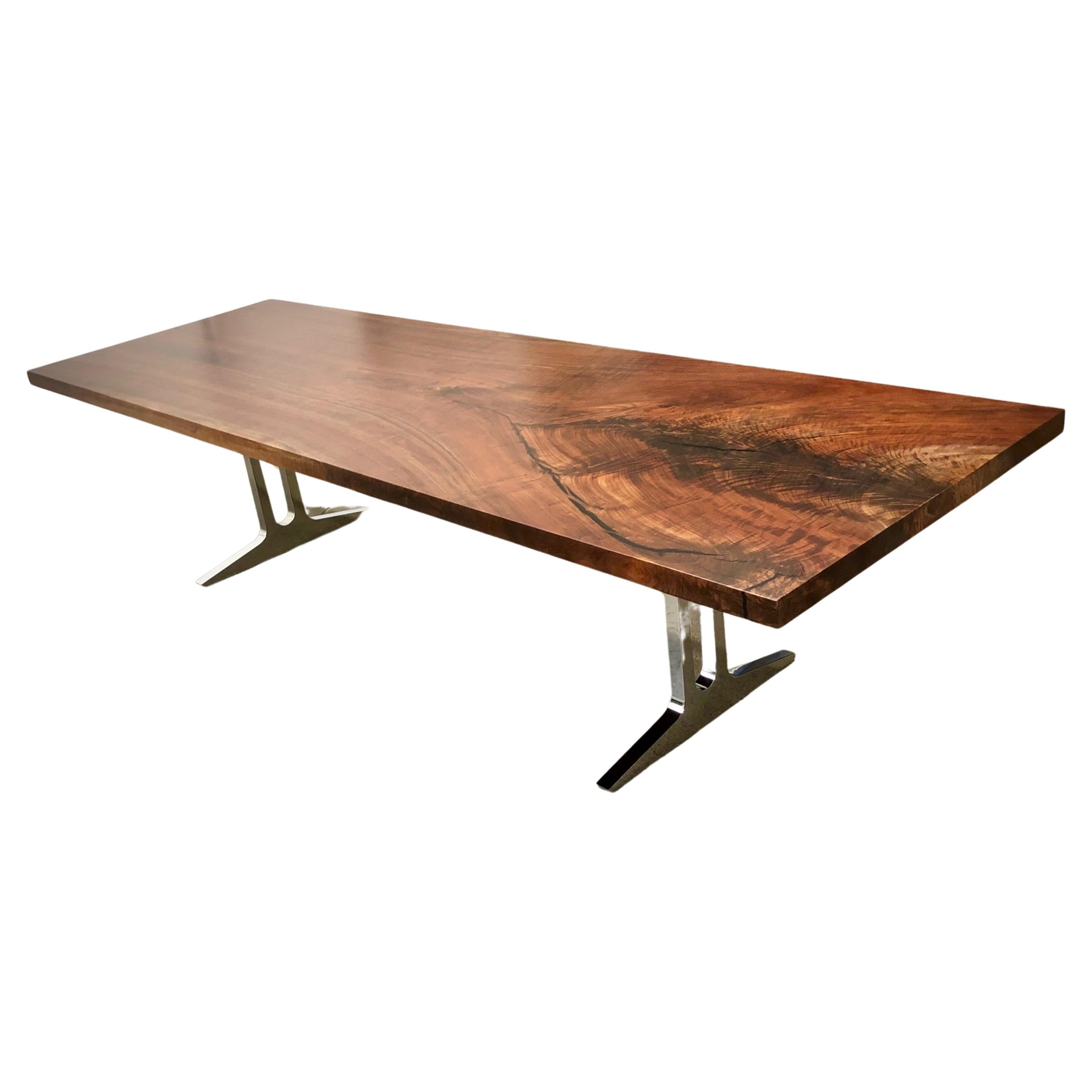 Single slab walnut dining table with mirror polished aluminum "Pi" legs For Sale