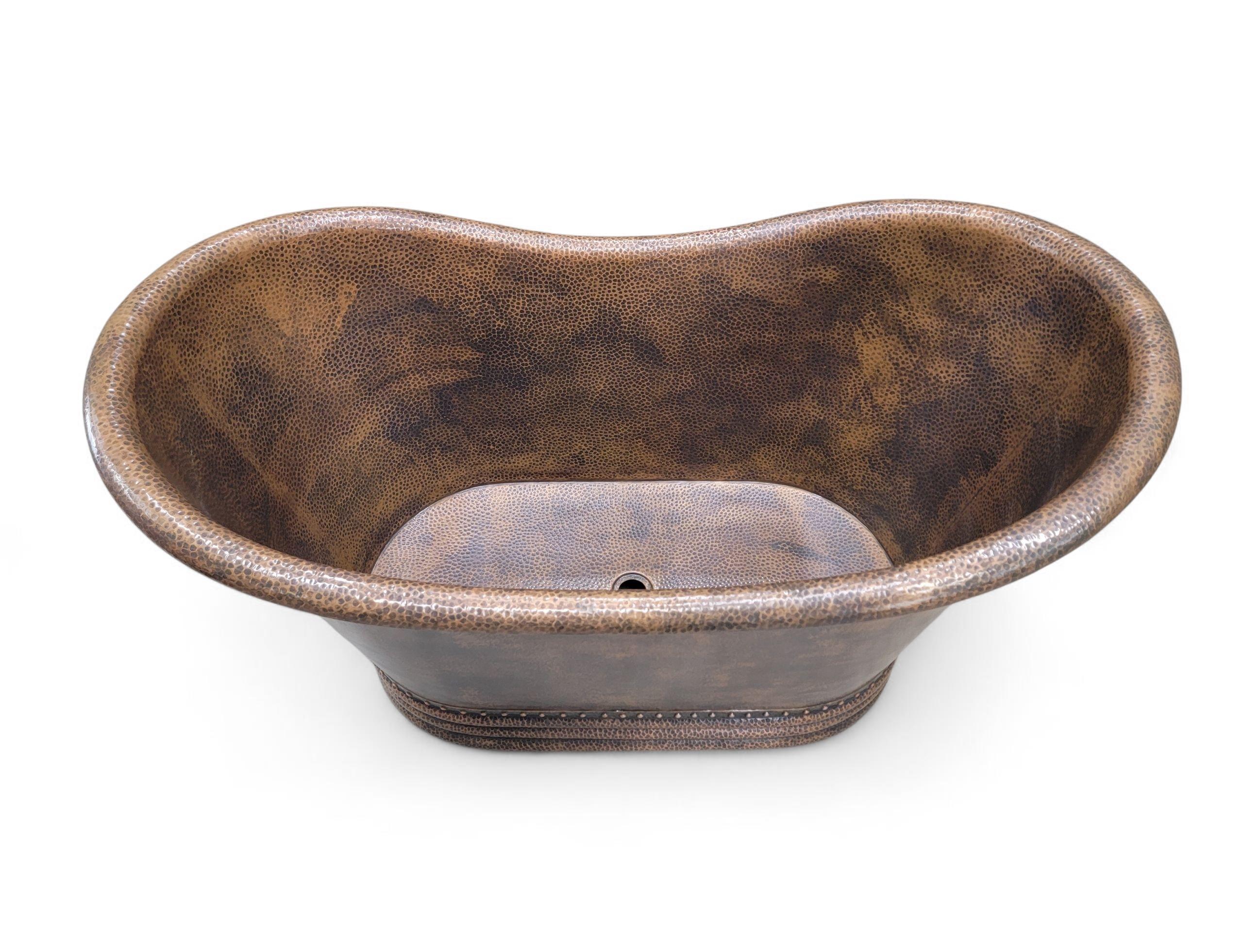 Single Slipper Hammered Copper Free-Standing Farmhouse Bath Soaking Tub

Decorate your eclectic space with this unique metal bath tub. Install this rustic piece in your bathroom to match your copper appliances. The base of the tub is minimally
