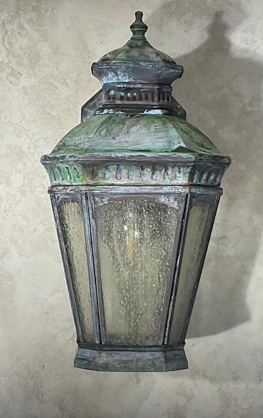 Single wall lantern made of solid brass, quality workmanship, electrified with one 60/watt light textured glass. Great light exposure.
Suitable for wet location. Less than Penny size crack in the upper one side glass of the  lantern , the crack is