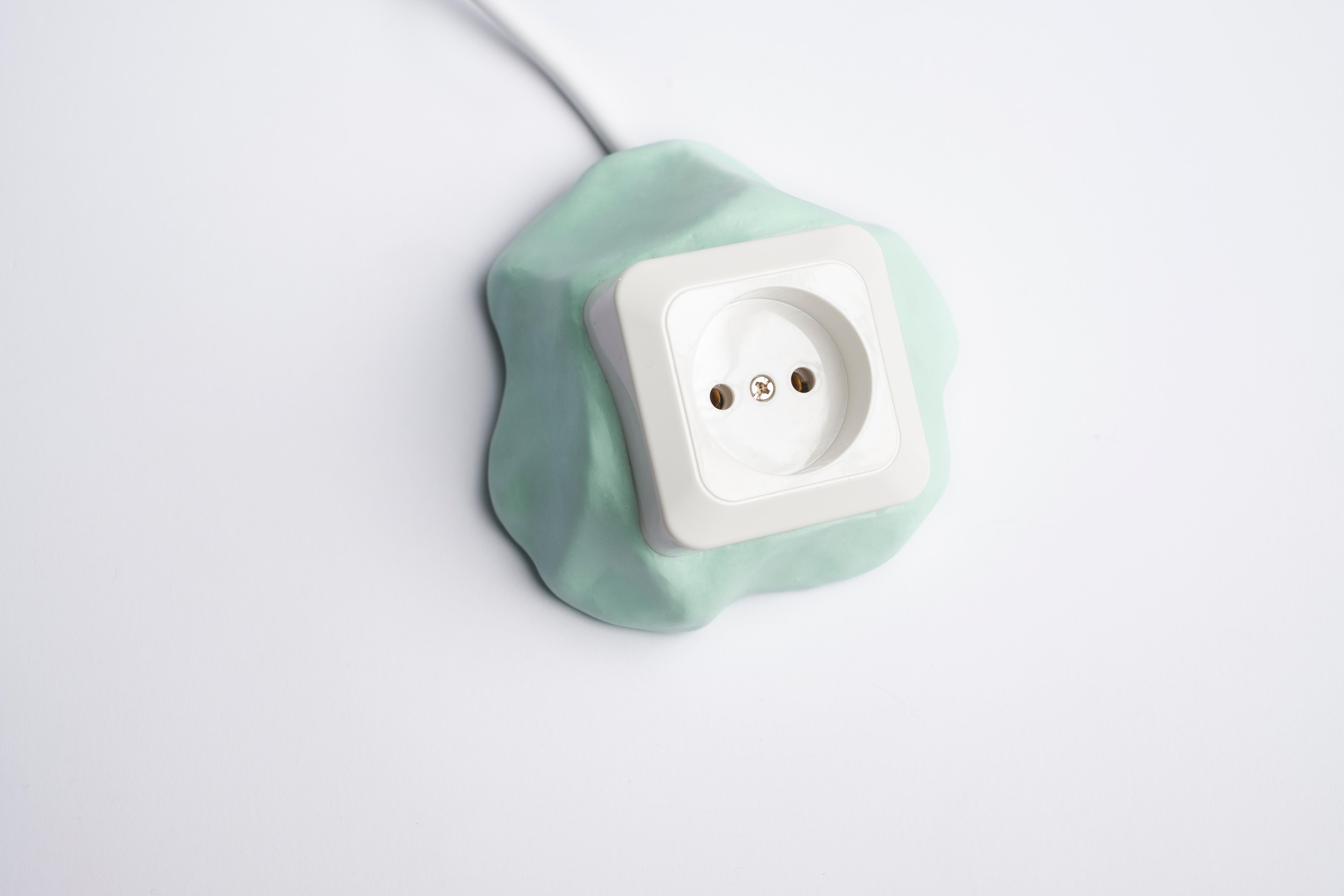 Single socket object 16.5. Mint SAKER by Studio Gert Wessels, mint. Hand crafted in an organic shape and made in his studio in the Netherlands. 

In his daily practice he investigates the relationship between form and function. The result is a