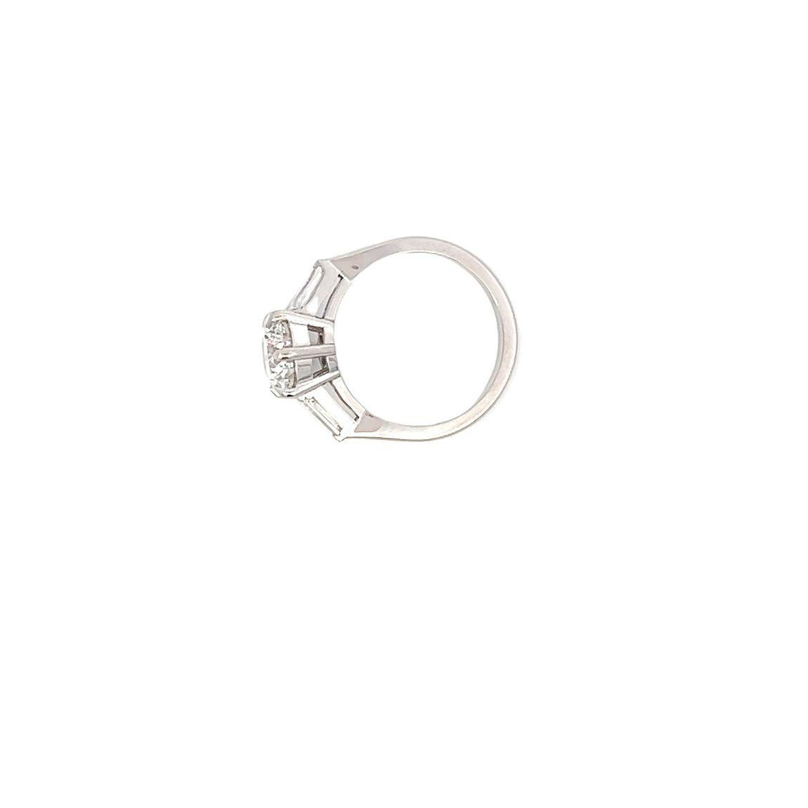 Women's Single Stone Diamond Engagement Ring with Tapered Baguette Diamond Shoulders For Sale