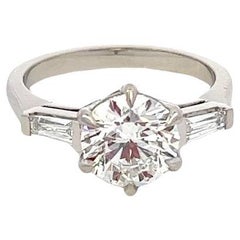 Single Stone Diamond Engagement Ring with Tapered Baguette Diamond Shoulders