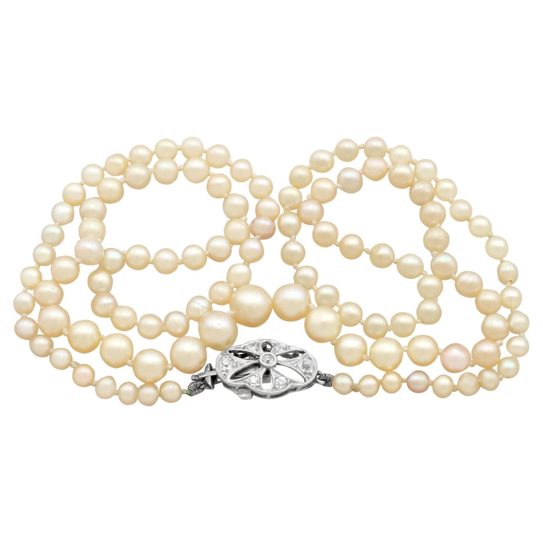 Single Strand Pearl Necklace with Diamond White Gold Clasp For Sale