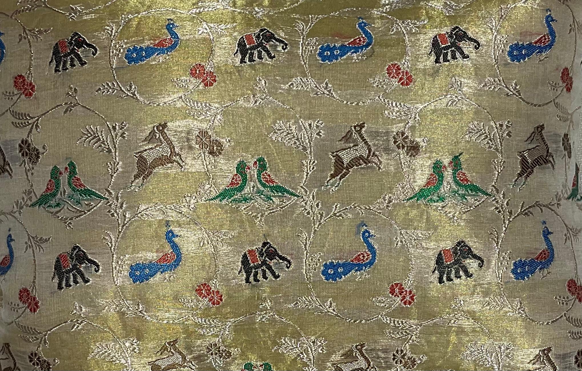 Beautiful pillow made of silk embroidery on metallic thread, with exceptional motifs of animals Elephant deer peacock and parrots and floral background.
Double inside lining, fresh quality insert.