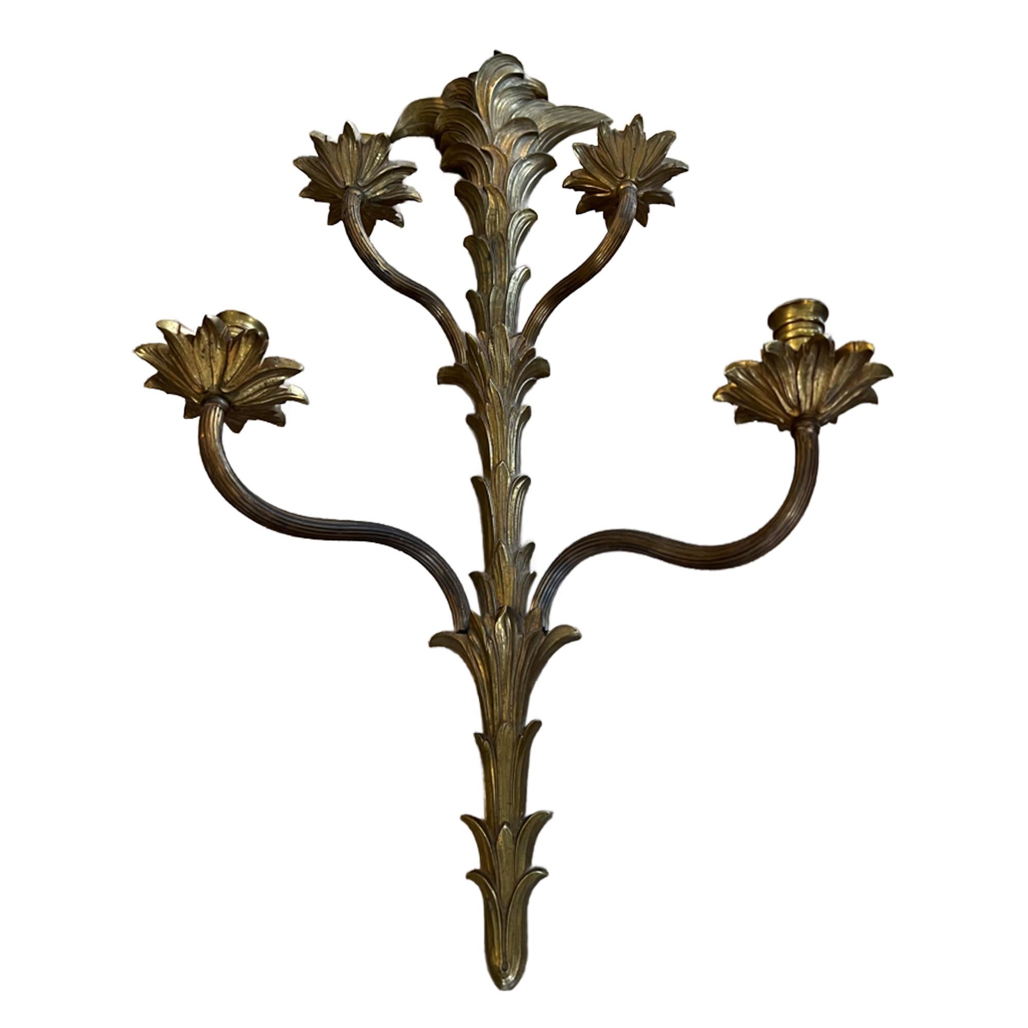 A fabulously large and decorative wall sconce.

Made from gilt bronze with a great naturalistic design. Lovely crisp casting. 

This light was made in France in the 1950s, the sconce has 4 lights. We've had it rewired for the UK, this can easily be