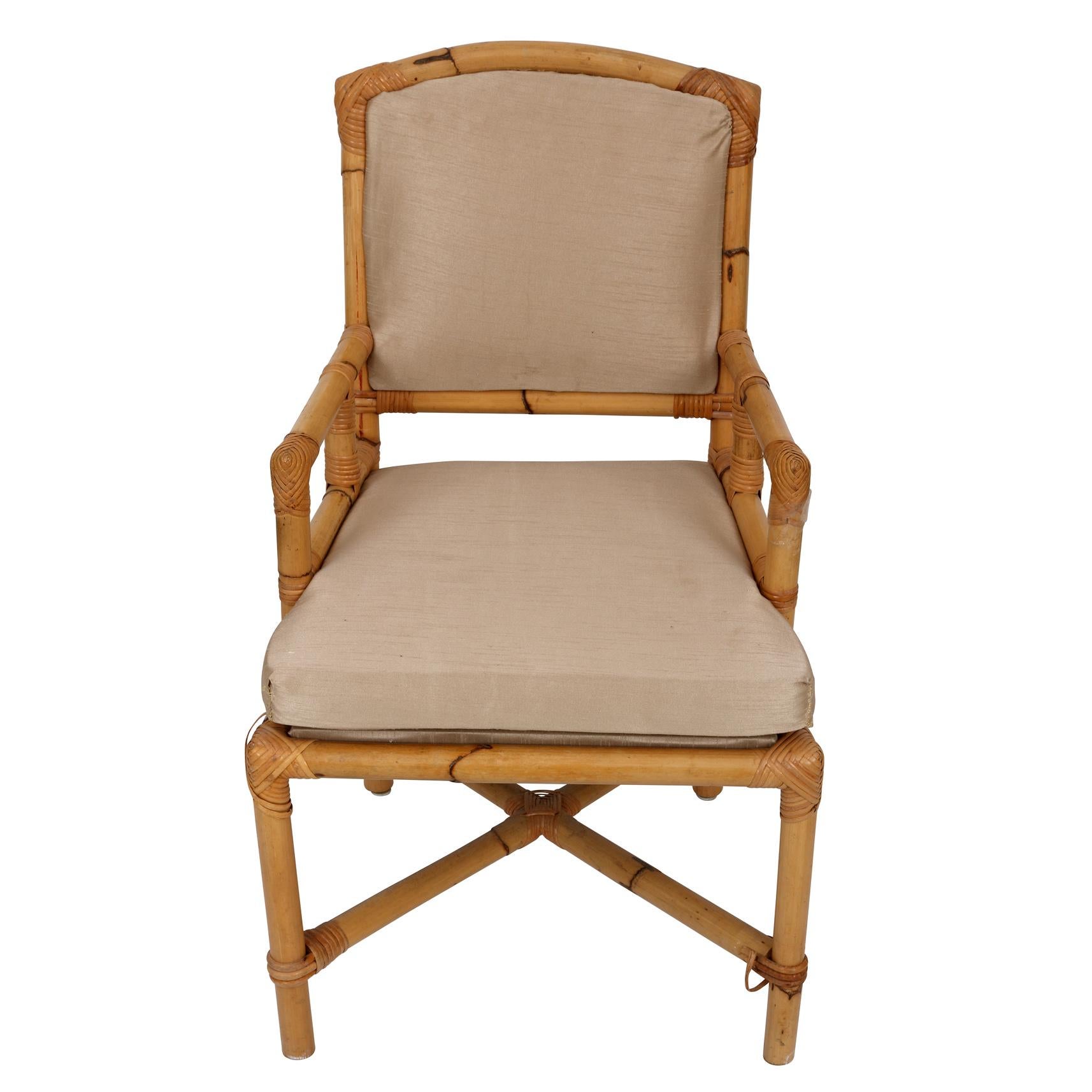 A perfect single bamboo and rattan wrapped armchair with newly upholstered beige raw silk cushion and back. A perfect desk chair for your office or reading chair in the guest room, the possibilities are endless with this super chic piece!