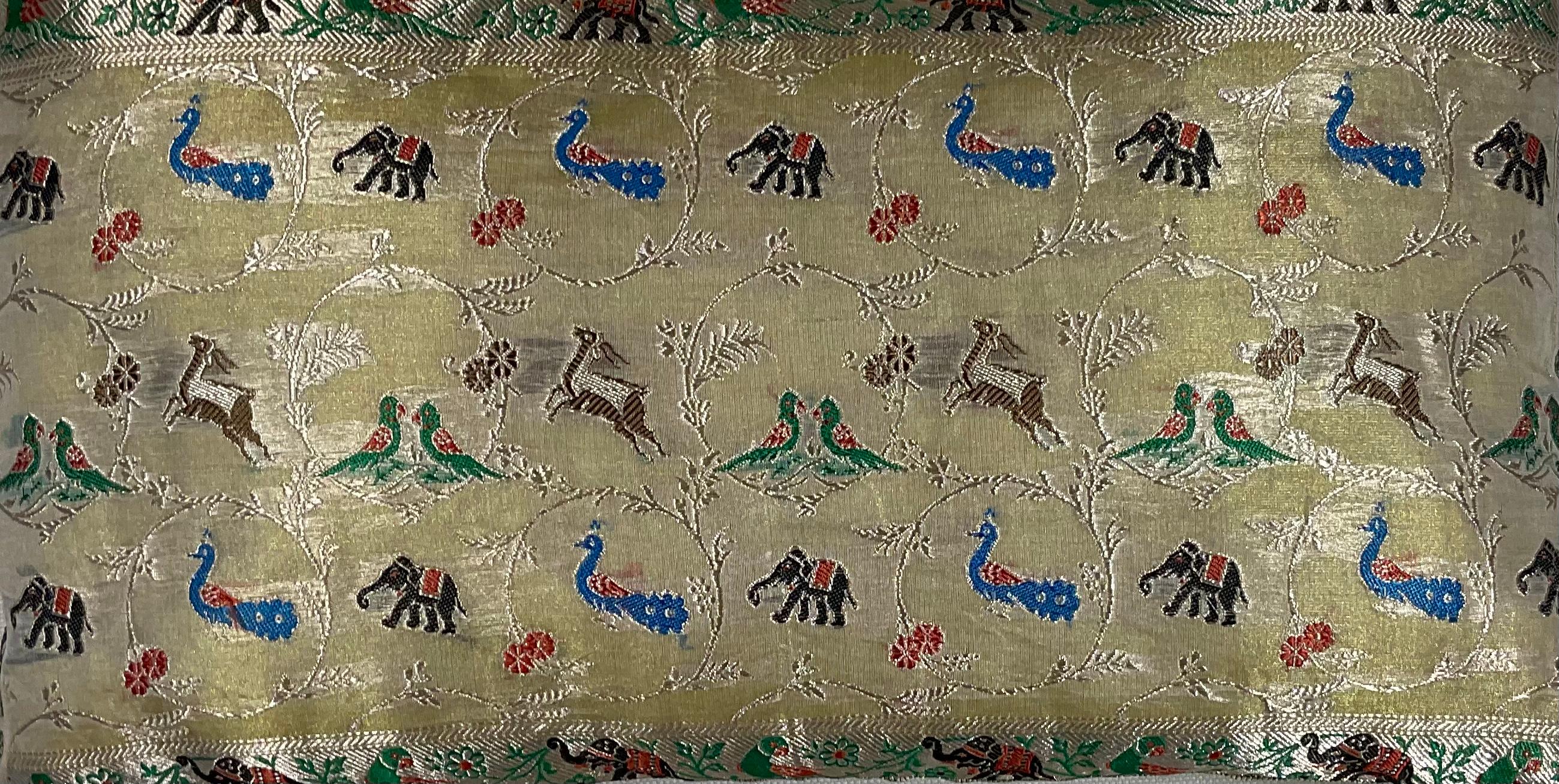 Beautiful pillow made of silk embroidery on metallic thread, with exceptional motifs of animals ,Elephant ,deer , peacock and parrots on floral background.
Fine backing, fresh quality insert.