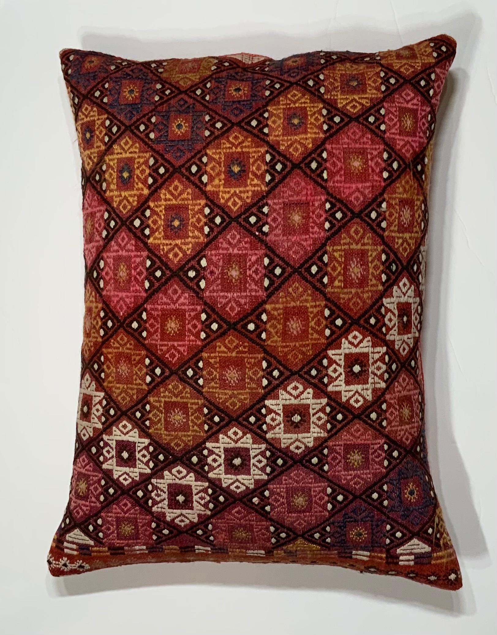 Beautiful pillow made of hand embroidery with exceptional happy colors of geometric repeated motifs. Quality silk backing, fresh new insert.