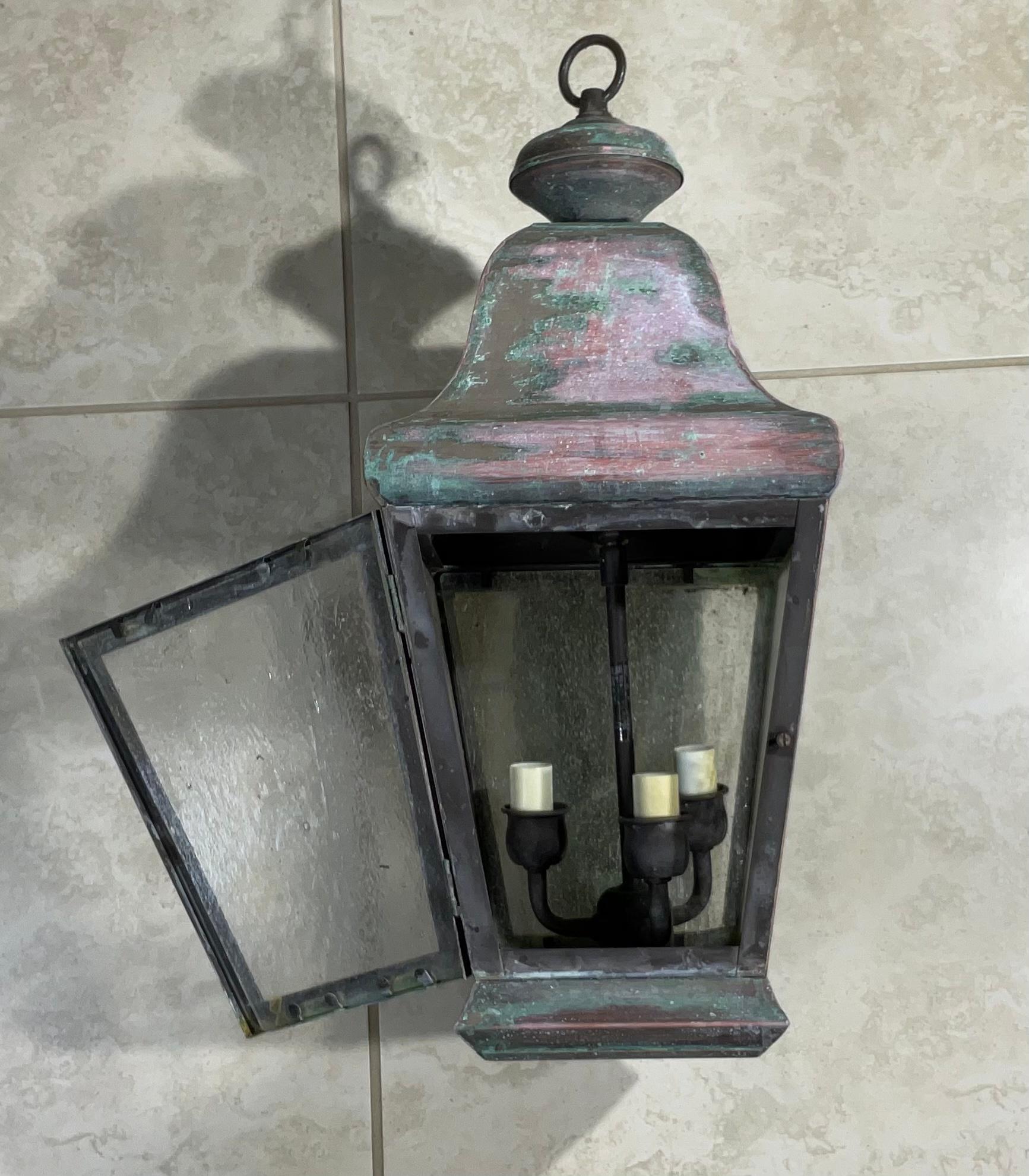 Exceptional single wall hanging lantern made of solid brass, quality workmanship, electrified with three 40 watt lights, beautiful patina great light exposure. Working and ready to use.
Suitable for wet locations.