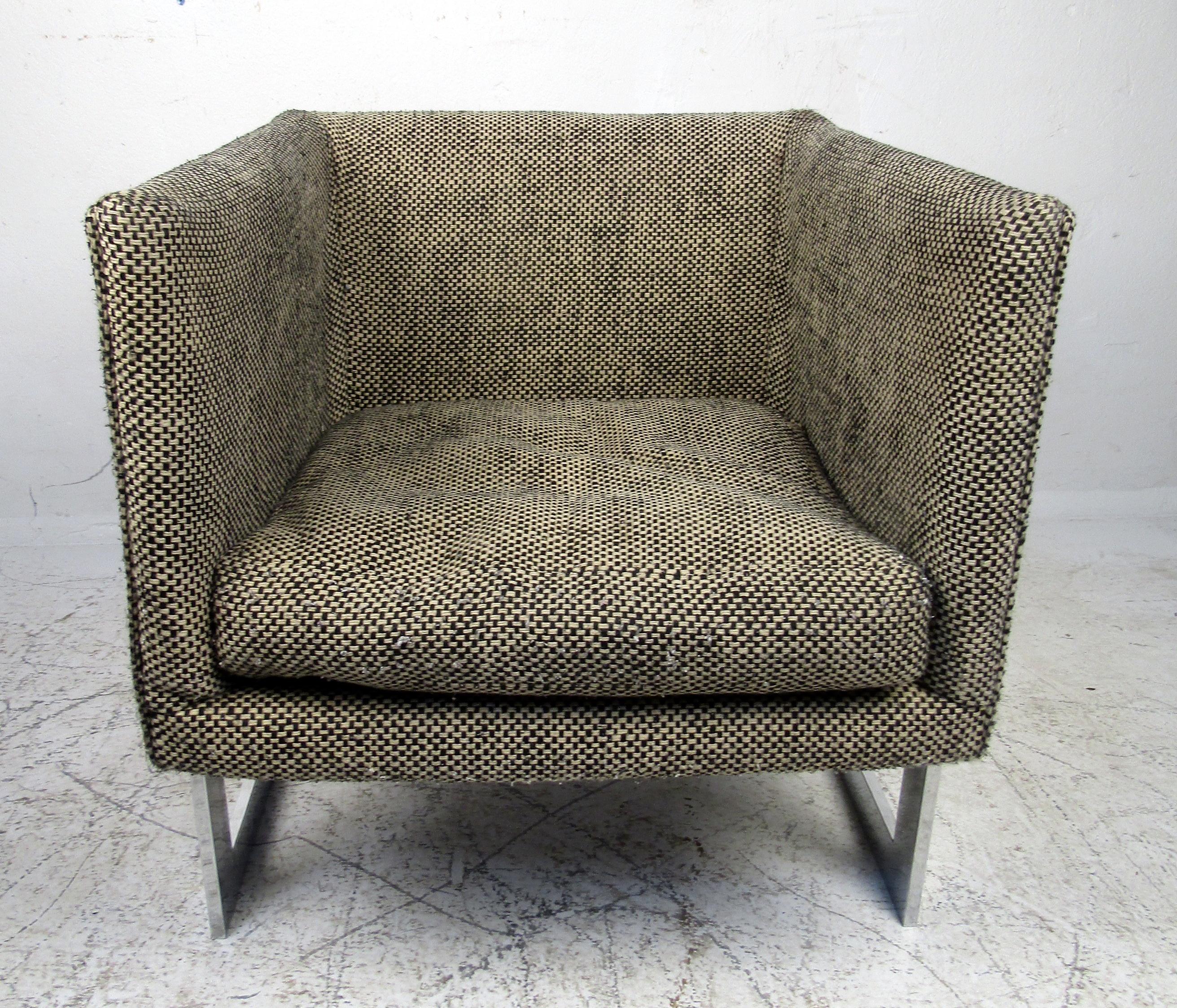 Mid-Century Modern Milo Baughman armchair featuring a unique upholstered seat, chrome frame.

Please confirm the item location (NY or NJ).
 