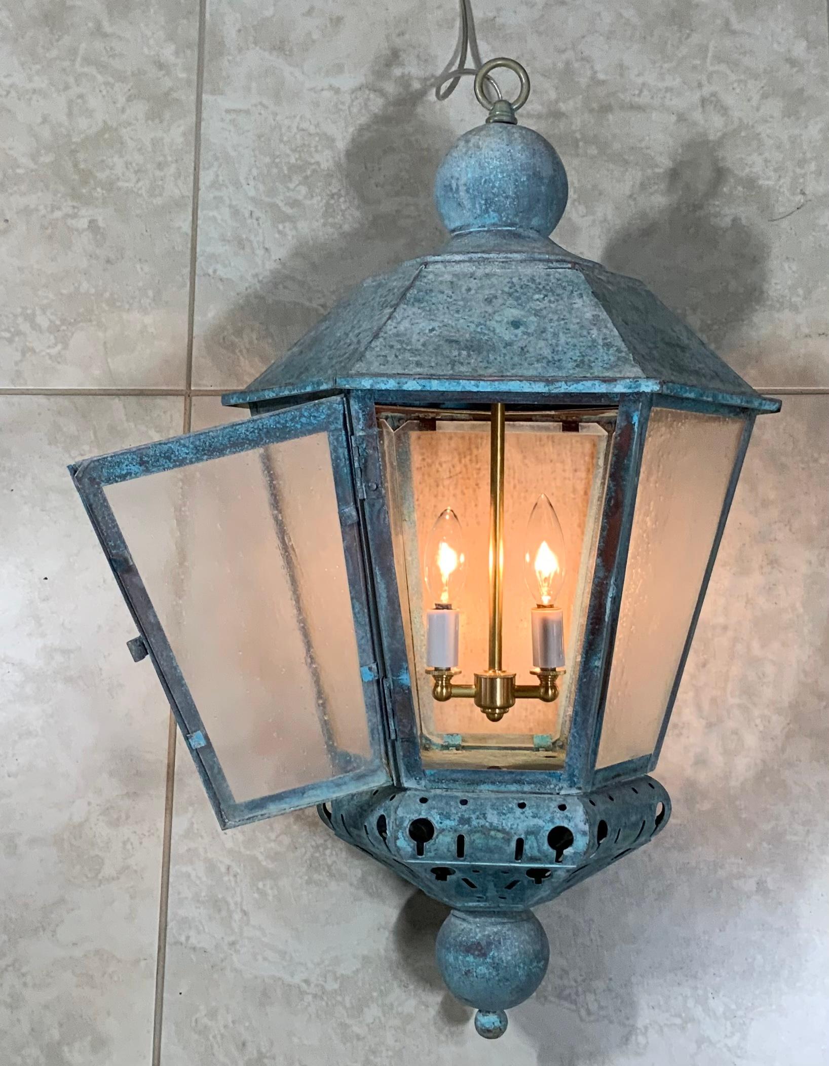 Artistically made vintage hand crafted solid brass and copper lantern with two 60/watt light , seeded acrylic glass like at all sides, with beautiful original weathered turquoise-green patina. Originally was converted from wall lantern to hanging