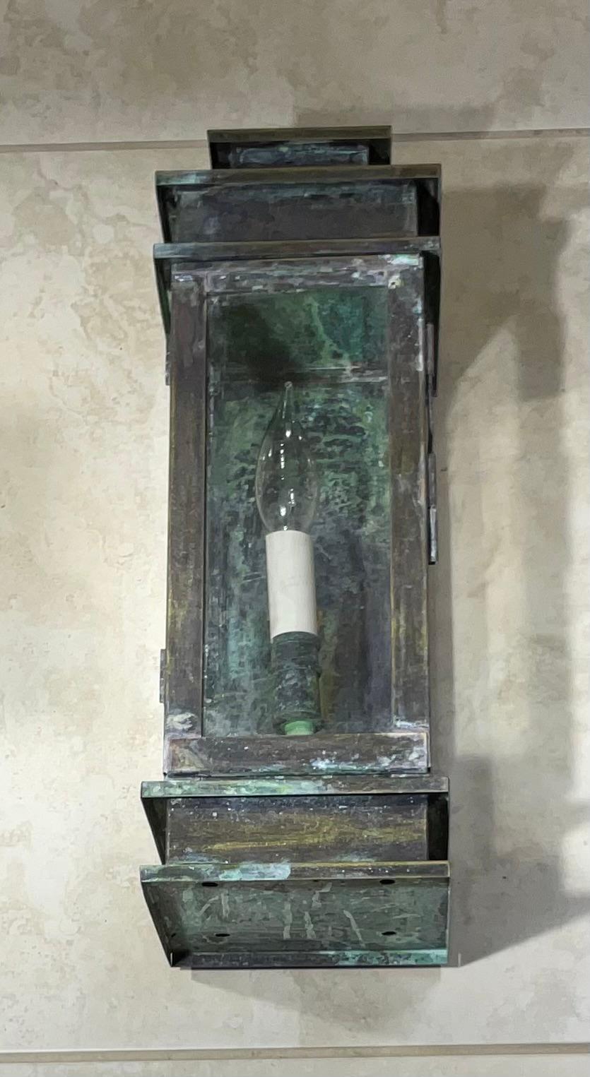 Single Wall lantern handcrafted of solid brass beautiful oxidized patina with one 60/watt light. Suitable for wet location .
UL approved up to US code.