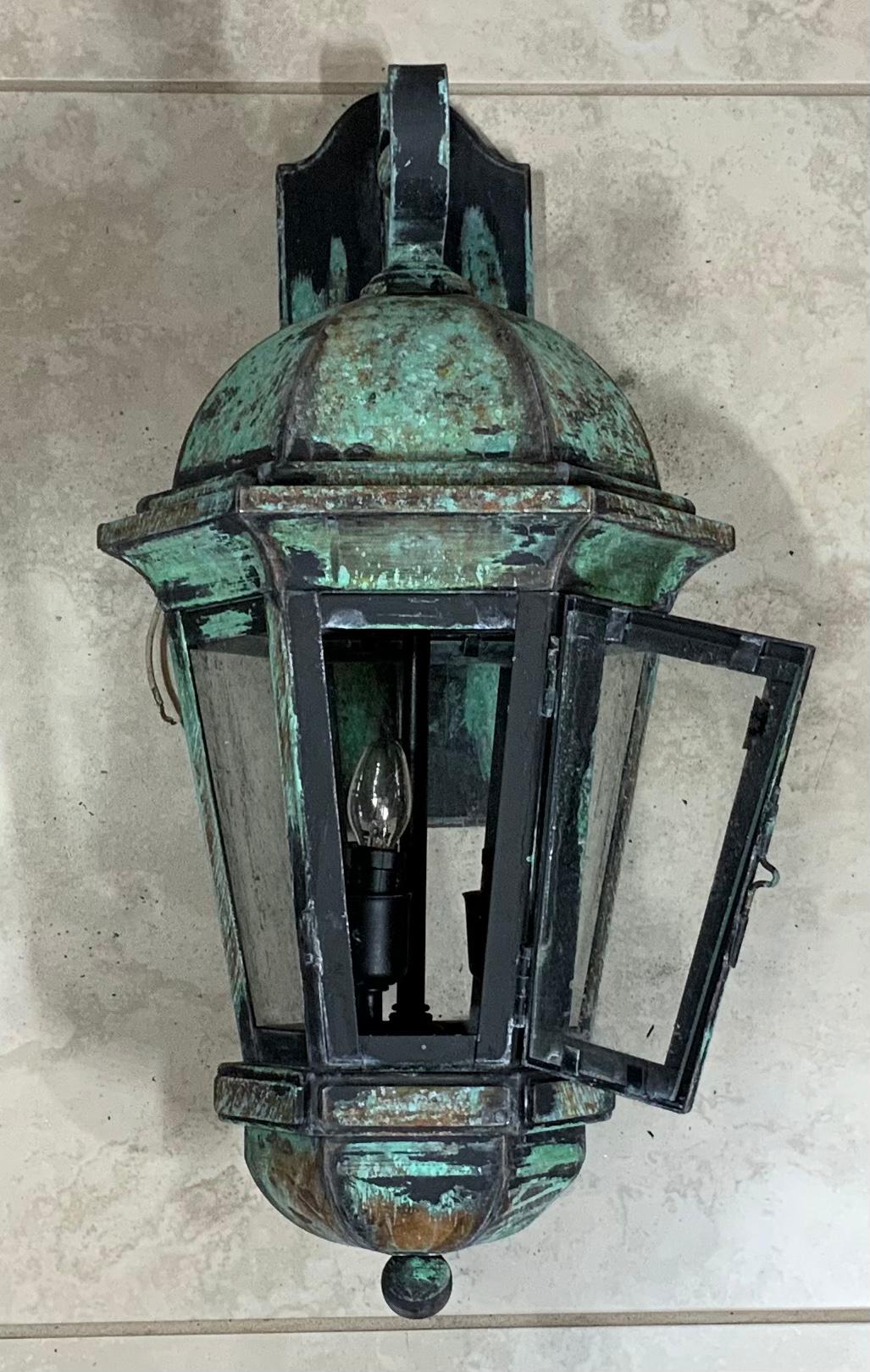 Single quality wall lantern made of solid brass, with three 40/watt lights clear glass,UL approved up to US code, suitable for wet location.
Beautiful patina.
Backplate size : 12”x 4” x 0.5.