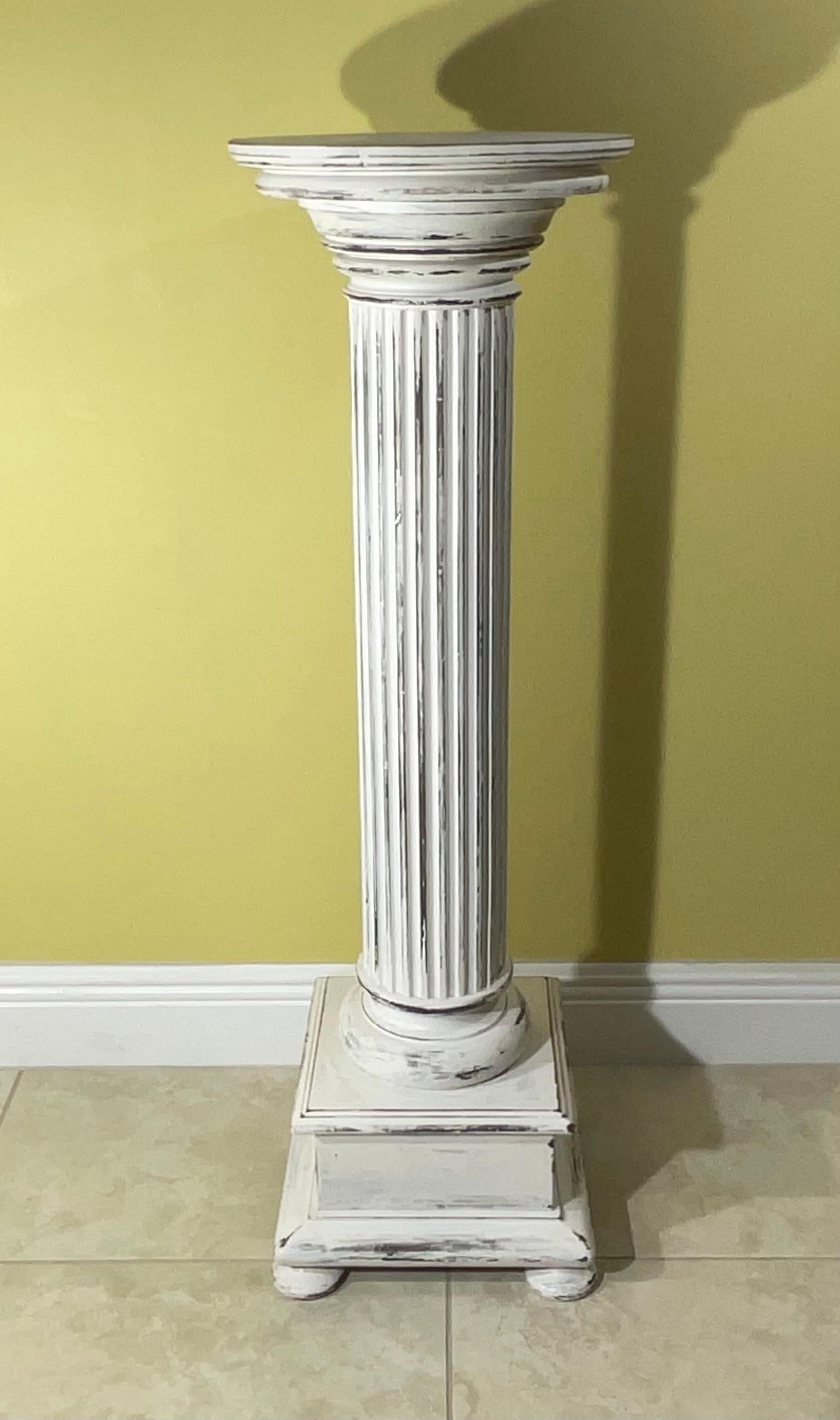 Elegant pedestal made of carved walnut wood , hand painted , nice patina ,with round top and square bottom.
Solid standing , great displaying feather pedestal.
Top size:13”
