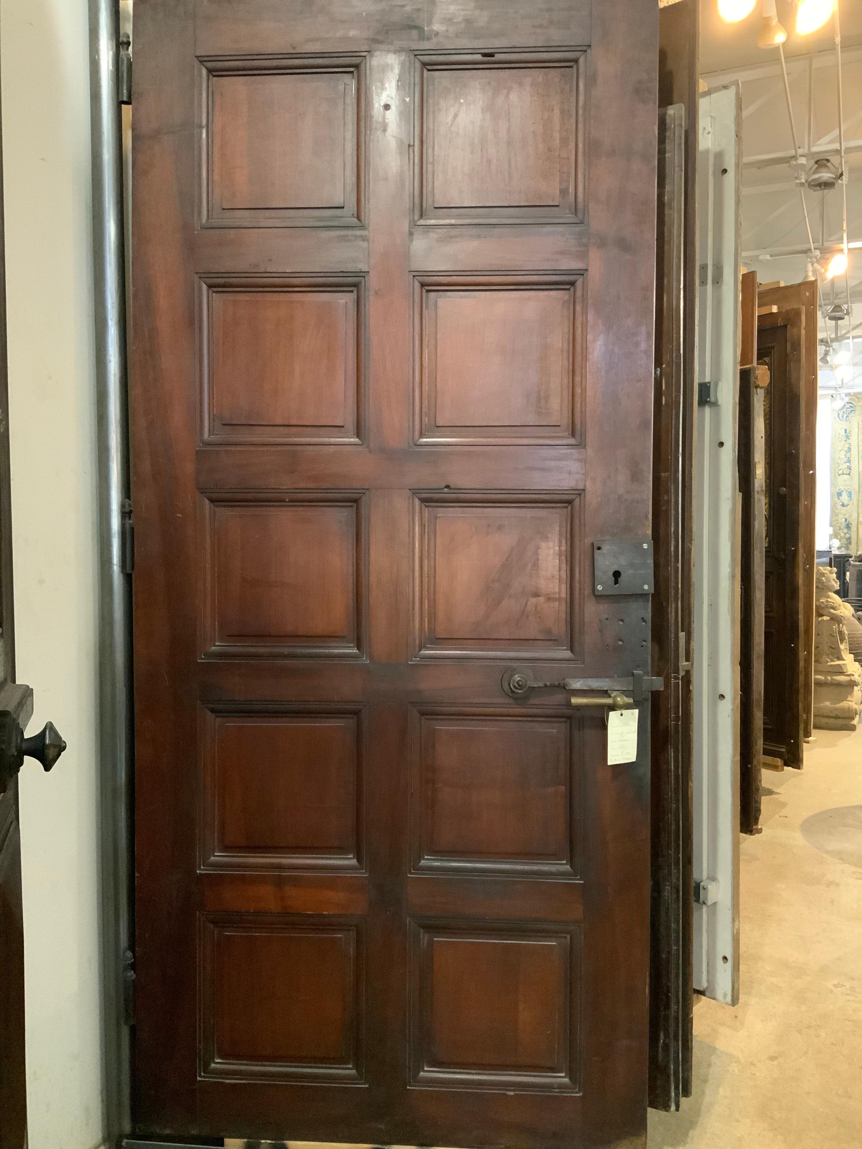 This single walnut door origins from France, circa 1860.

It have 10 square inset panels.

  