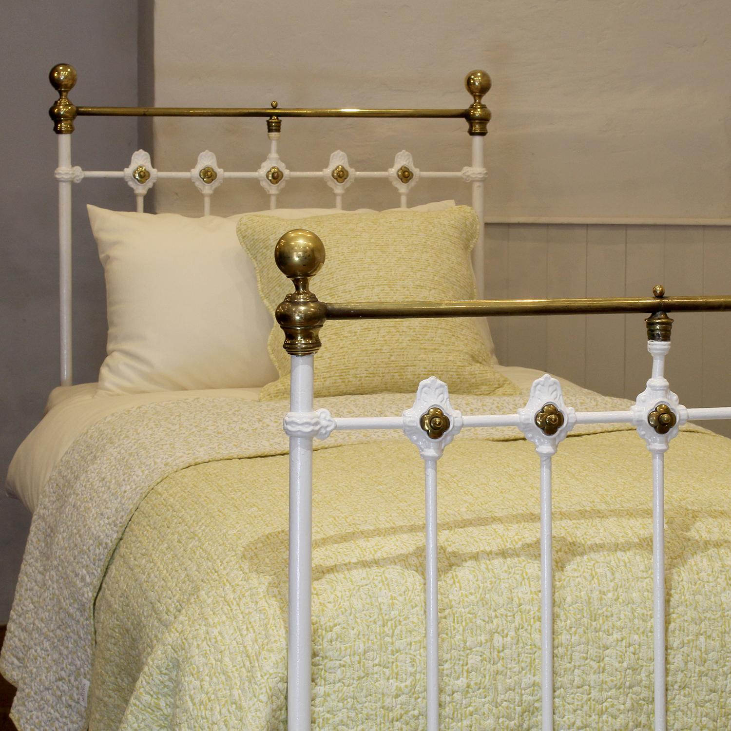 white brass bed