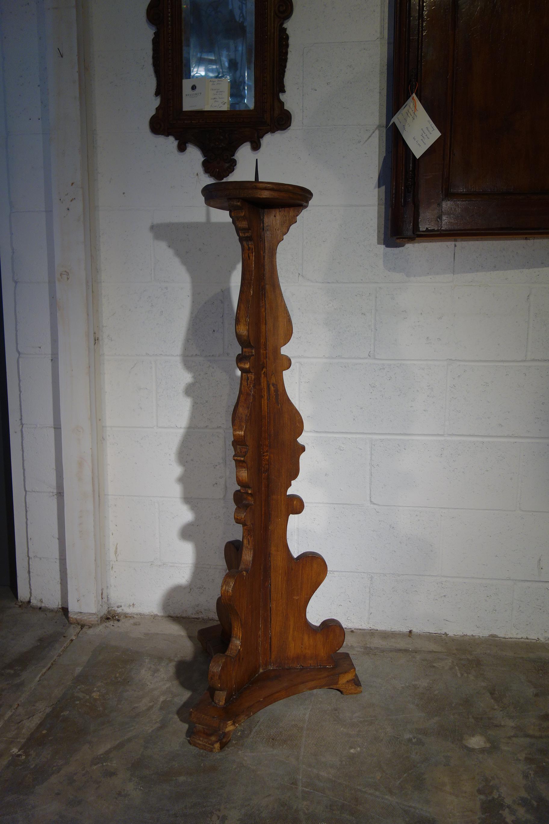 Tuscan refectory style single hand carved rustic candlelabra with forged nail spike.  Italian fruitwood. 

Dimension: 46