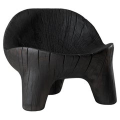 Single Wood, Pietra vulcanica, Marmo Batan Lounge Chair di Sebastián Cappiello
