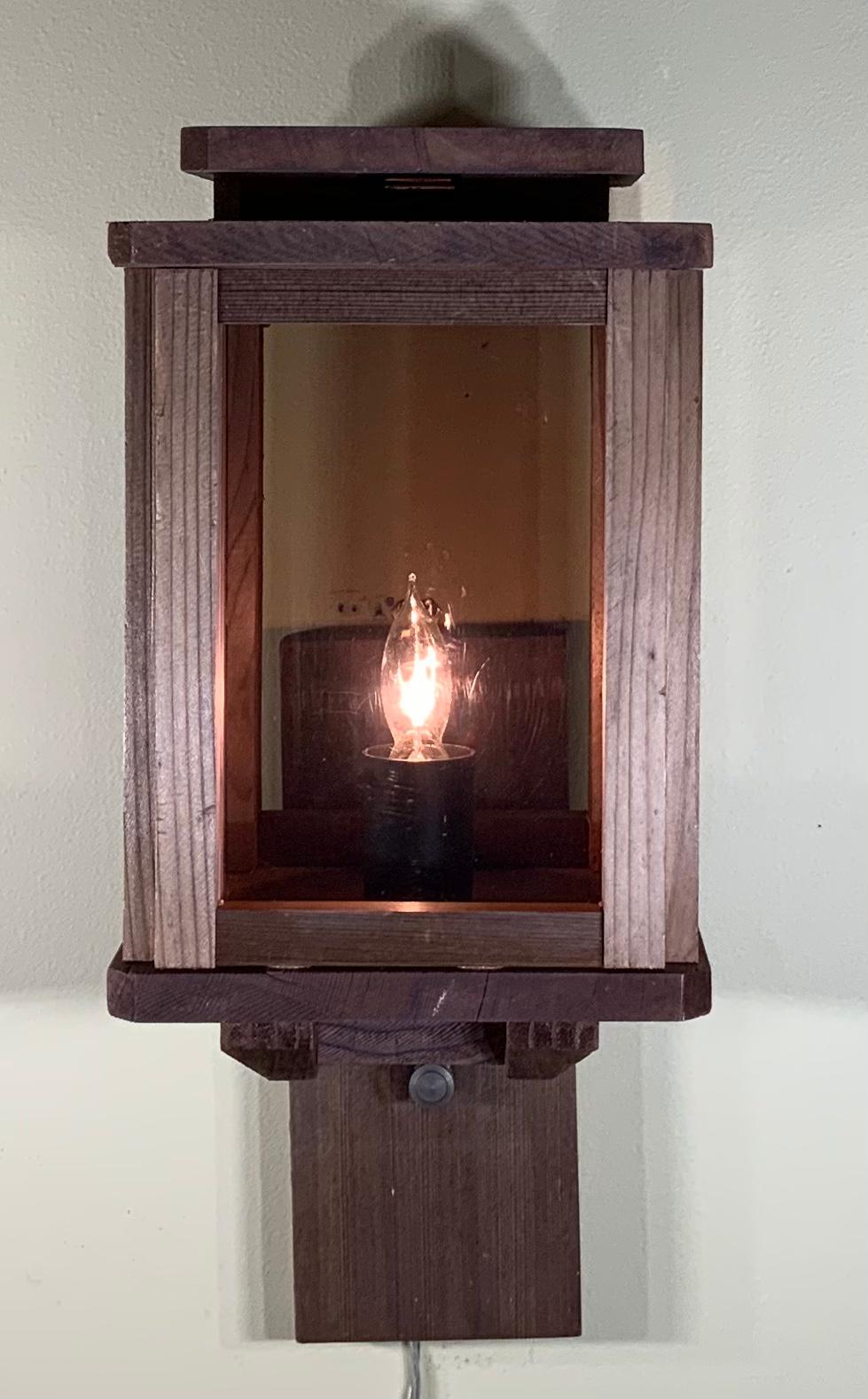 Custom made lantern made of Cyprus wood, four greyish acrylic sides, with one 75/watt light
Electrified and ready to use. Will look great on front cabin or side garage.
Easy lightbulbs change with twin screws from the top.
Backplate size: 5”.5