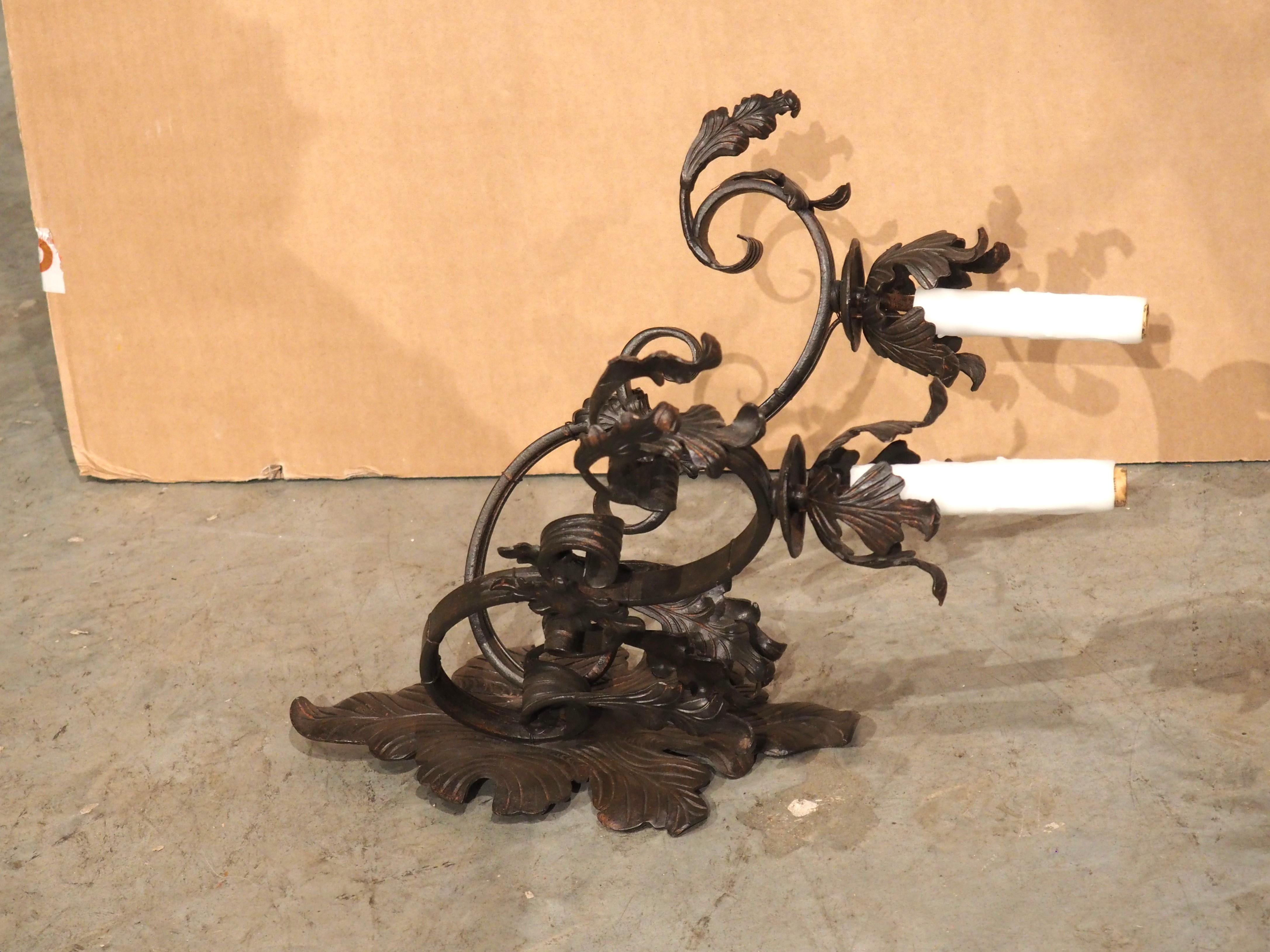 American Single Wrought Iron Wall Sconce with Foliate Ornamentation For Sale