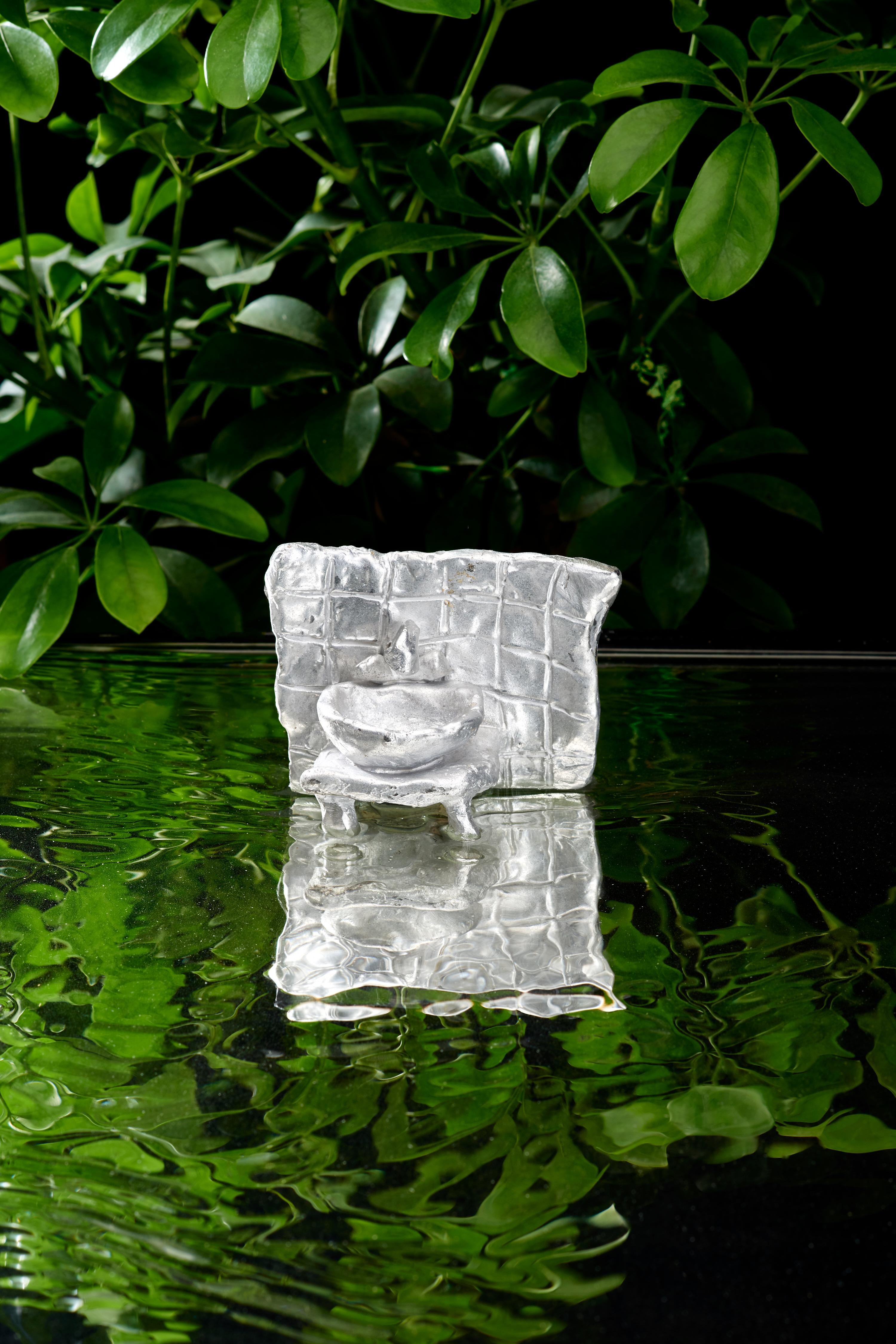 Unique, handmade, signed sculpture from the 'Oasis' series (2022) by Olga Flór. 
This standing piece is made from bee wax and cast into aluminium.
Aluminium (200g)
Comes with a signed certificate of authenticity

The 'Oasis' series reveals the