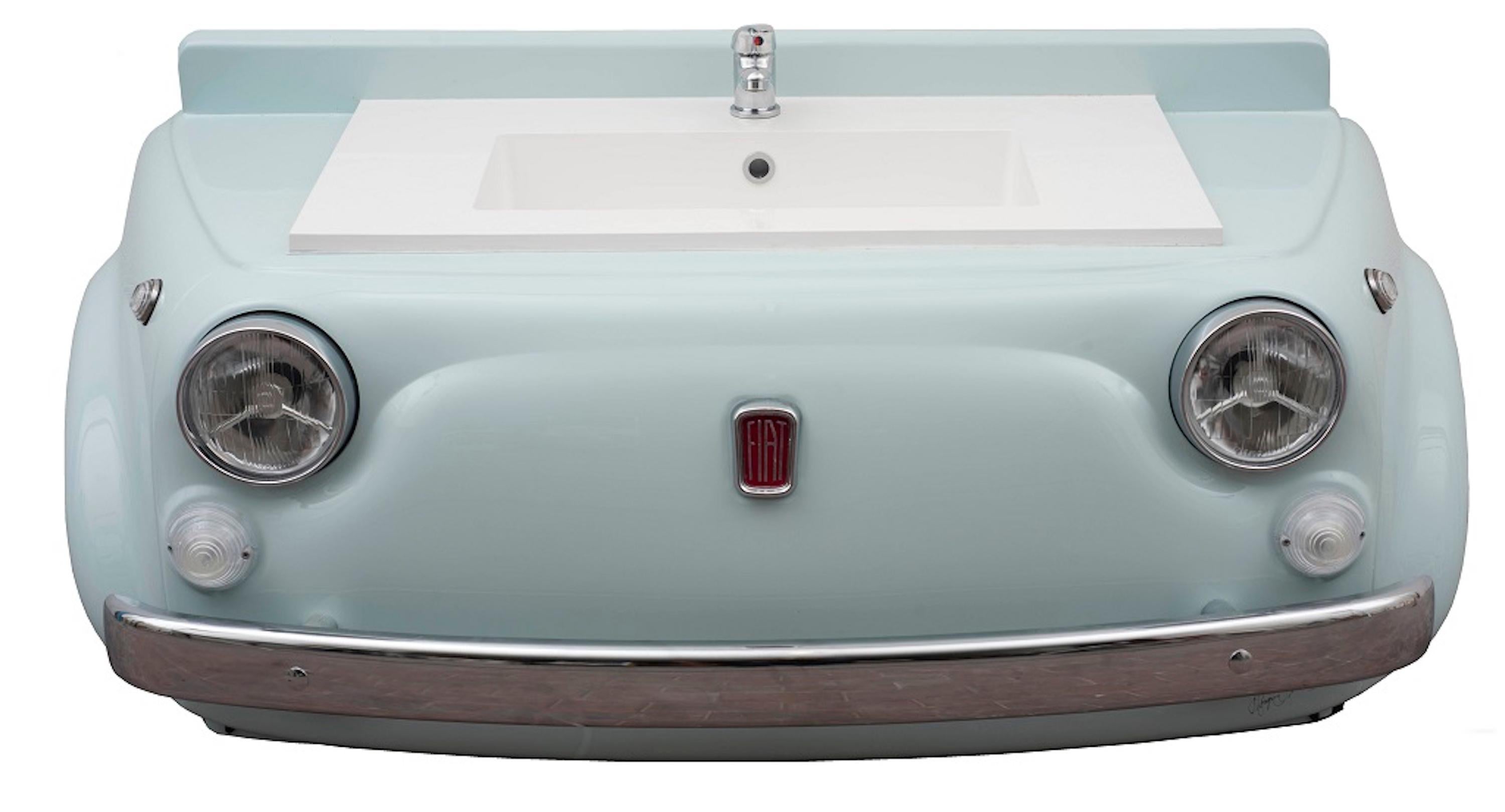 Sink model Michelle 01 is an original design artwork realized by Michele Di Gregorio in 2019.

This unique work was realized with a grille of a vintage car Fiat 500, modified with a hand-wrought ten-tenths metal sheet. The piece comes with a