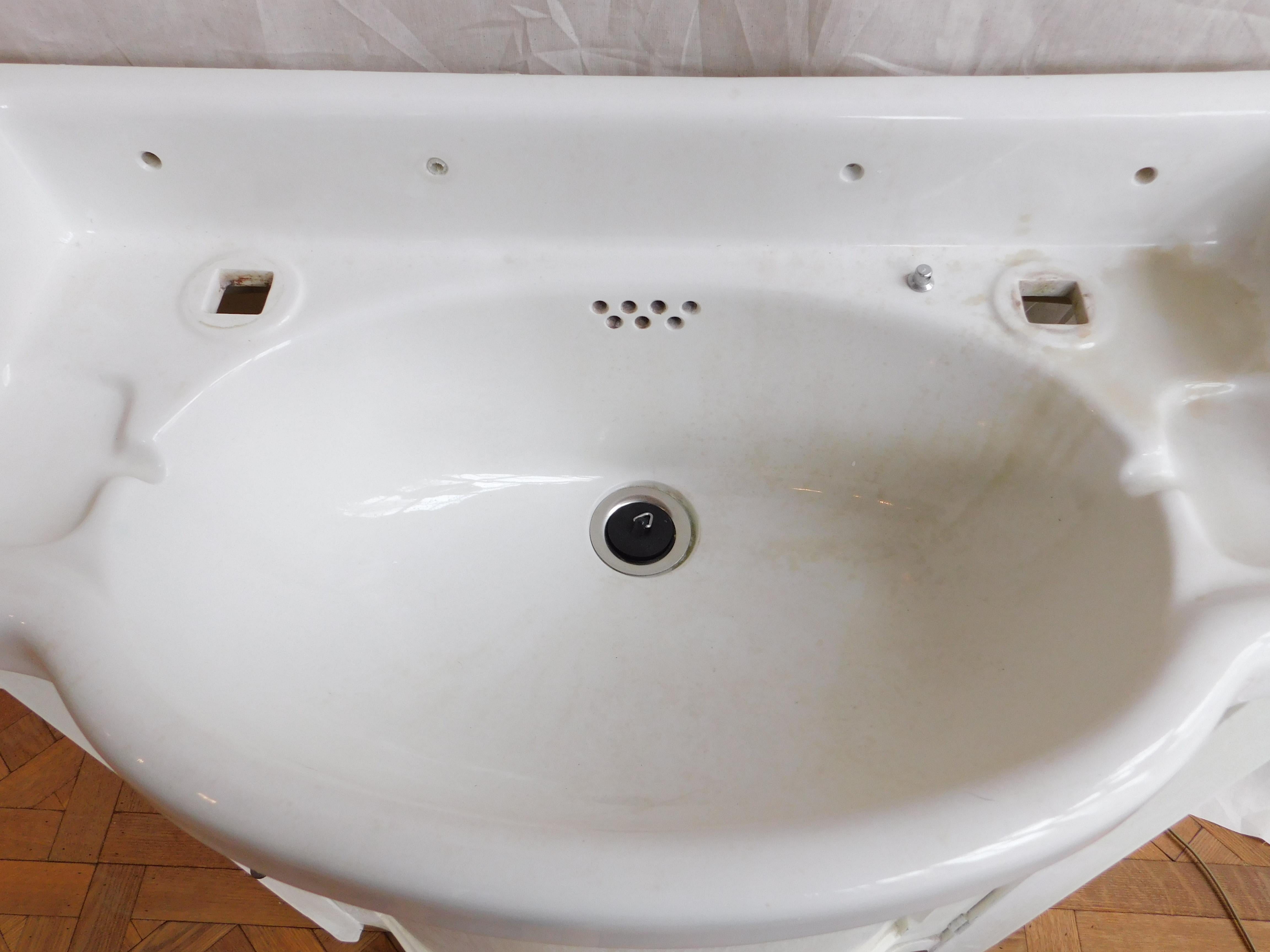 English sink made by Alfred Johnson & Sons Ltd., circa 1915
The sink is an unusually narrow size which will fit perfectly into a small bathroom, and the cabinet provides a good amount of storage (as well as a way to hide the plumbing pipes).


 
