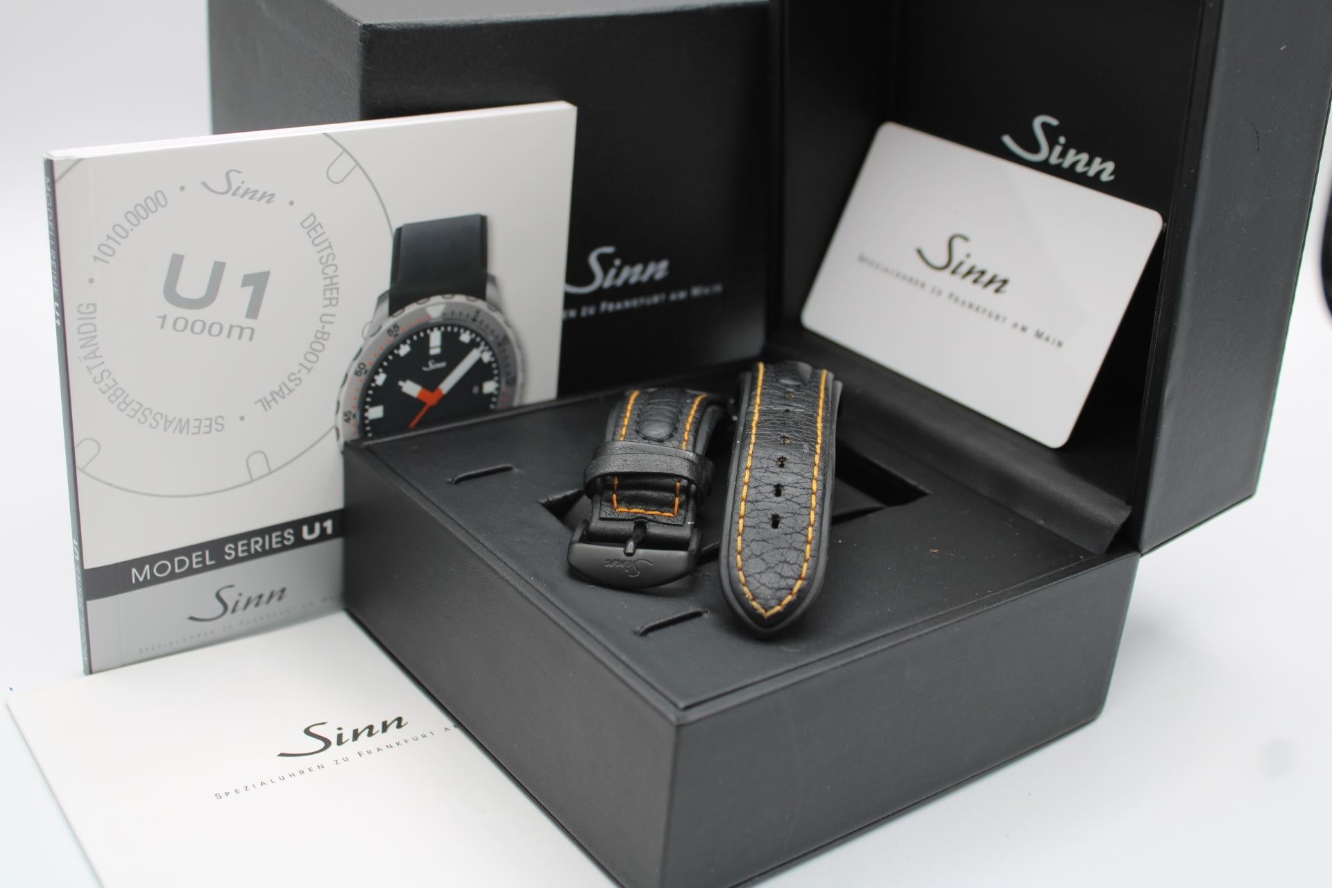 The Sinn U1 goes further than most other watches, Dive to the depth’s of 1000 meters.

This 2021 model is in fine working order and complete with box and papers. Fitted to a generic blue rubber strap and buckle with the original black leather strap