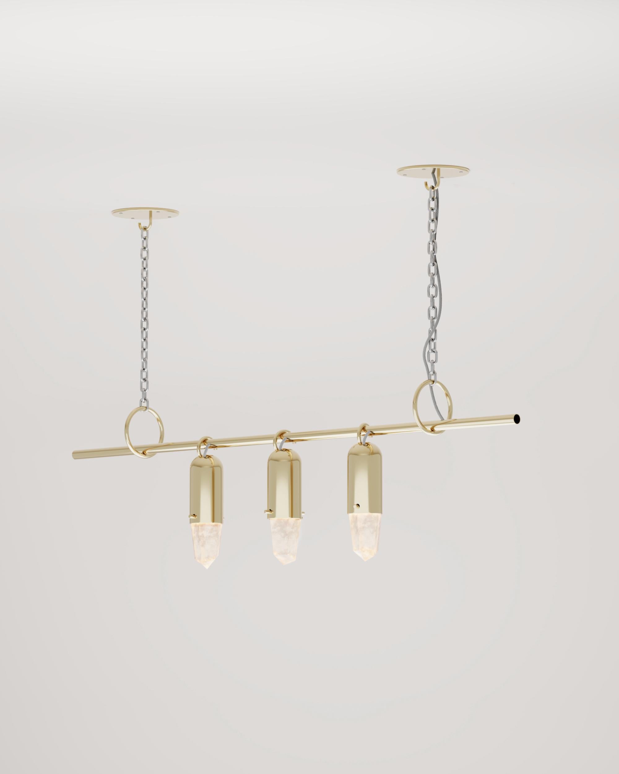 Lámpara colgante Sino Lustre de Studio Orth
Dimensiones: An 180 x Pr 20 x Al 112 cm, H: A medida. 
Materiales: Metal fundido, acero y cristal.
Acabados: Latón fundido pulido o Aluminio fundido pulido

También disponible en latón fundido pulido o