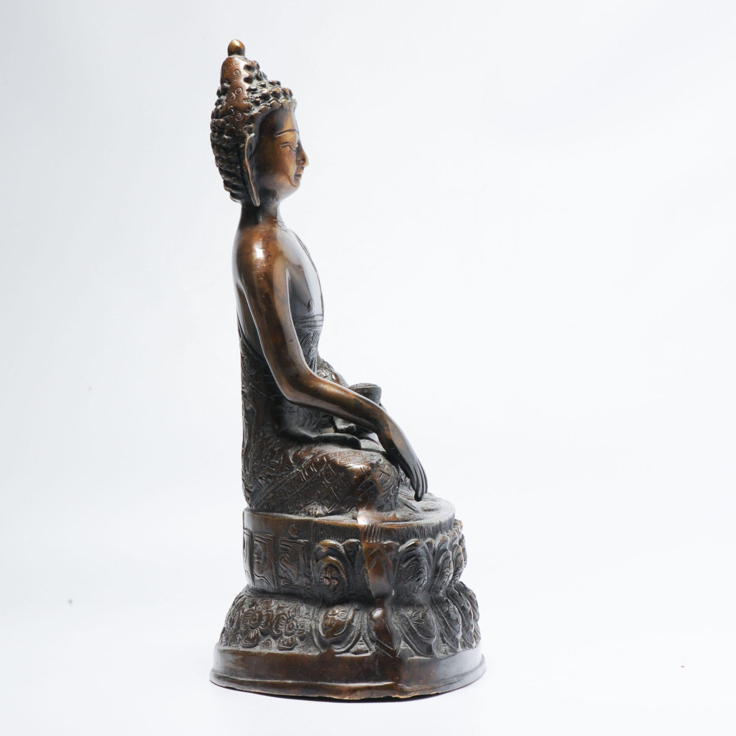 A 20th c Sino- Tibetan - Nepali statue. Bronze or cast iron.

Additional information:
Material: Bronze, Cloisonne & Metal
Region of Origin: China
Period: 20th century
Condition: Perfect, just some ware.
Dimension: 18 W x 27 H cm