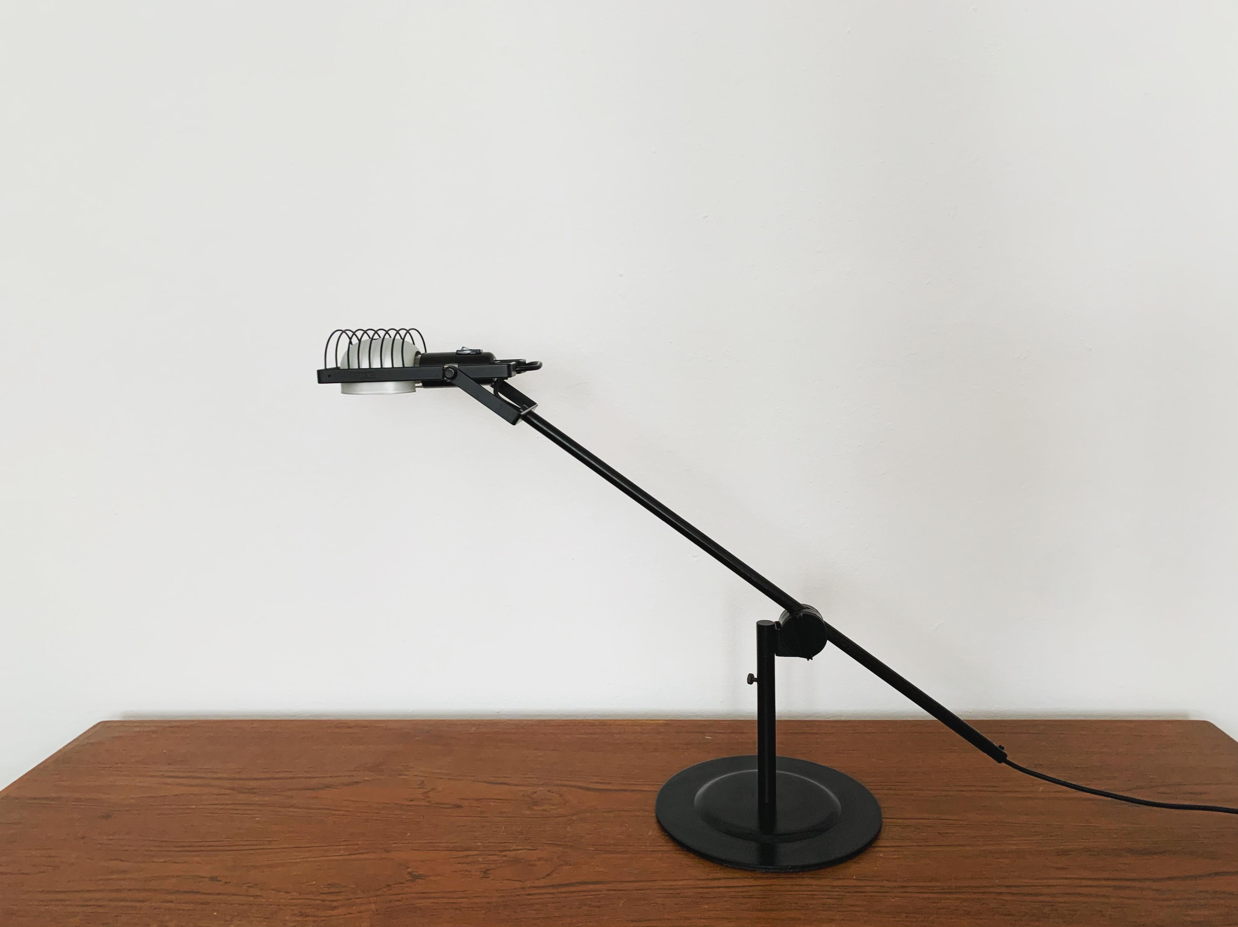 Fabulous Italian desk lamp by Ernesto Gismondi from the 1970s.
Industrial design and high quality workmanship.
An absolute highlight for every design lover.

Design: Ernesto Gismondi
Manufacturer: Artemide

Condition:

Very good vintage