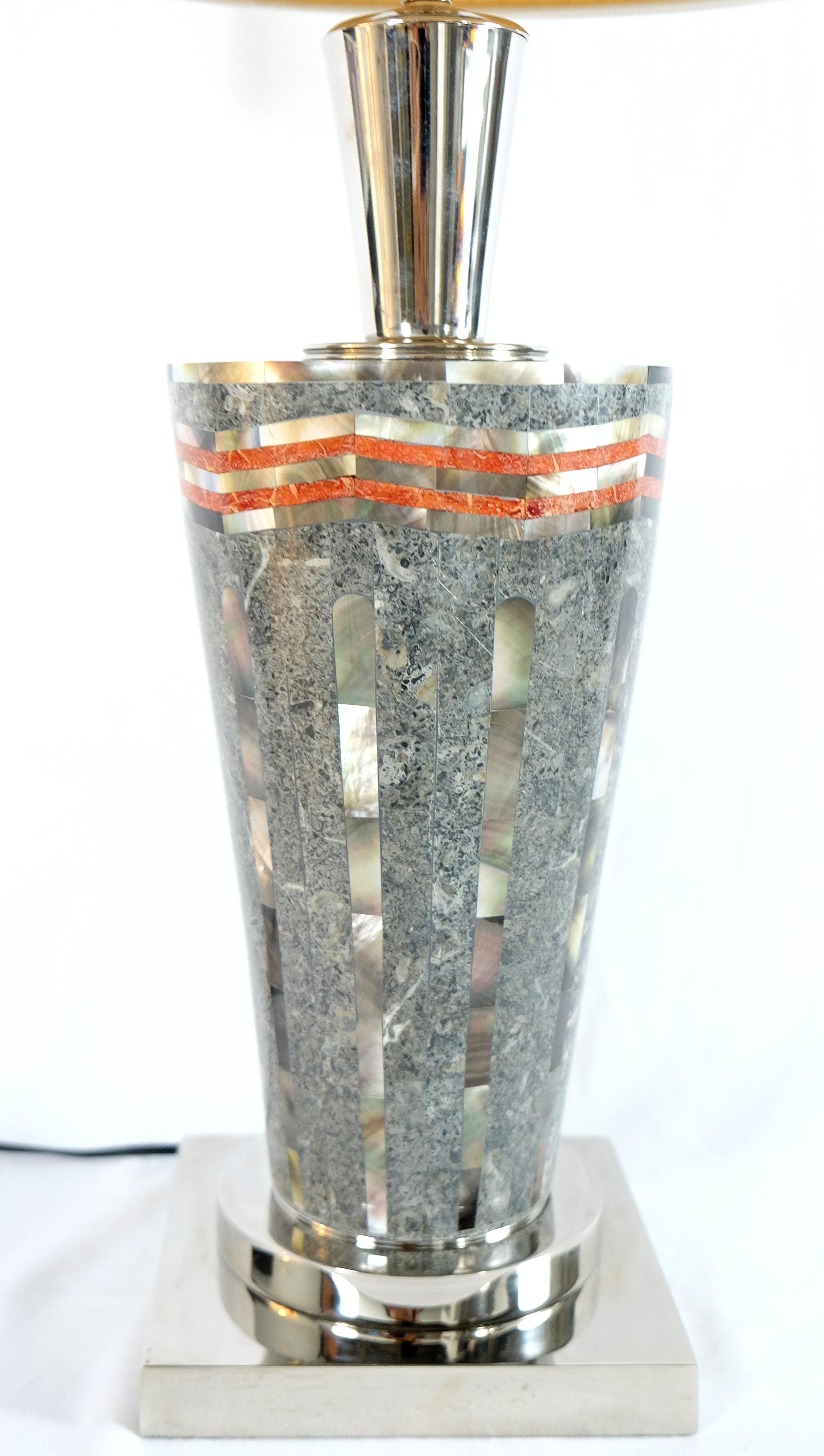 Laudarte Srl of Italy Table Lamp in Marble and Mother-Of Pearl 

Offered for sale is the Sintex Table Lamp with a sleek mosaic body of Mother-of-Pearl and stones from Ludarte Srl of Italy. The lamp is accented with brass details and completed with