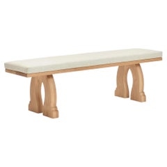 handmade solid oak wood Sintra Bench, curved legs and cushion cream