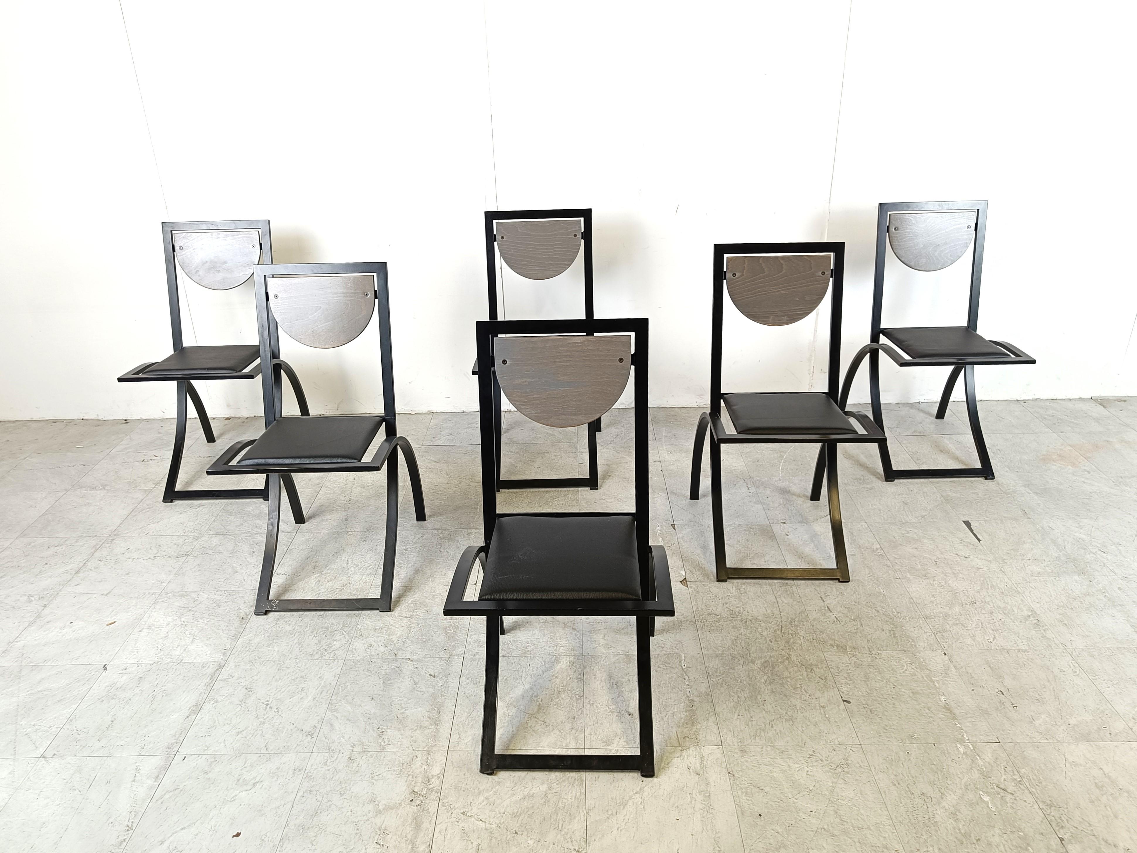 Vintage 'Sinus' dining chairs by Karl Friedrich Förster for Kff for KFF Germany with a metal frame and a leatherette upholstery and a wooden back panel.

Timeless design, very good condition

1990s - Germany

Dimensions:
Height: 88cm/34.64