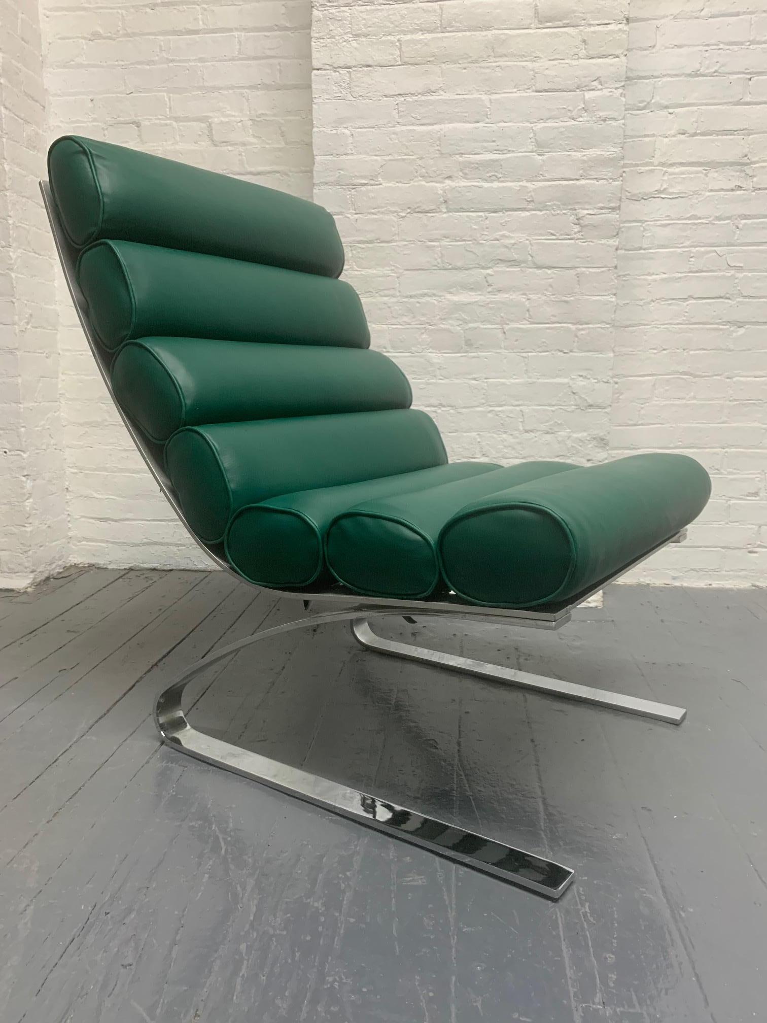 Sinus lounge chair and ottoman by Reinhold Adolf & Hans-Jurgen Schropfer for COR. The chair and ottoman has a heavy cantilevered steel frame with a green newly upholstered leatherette fabric.