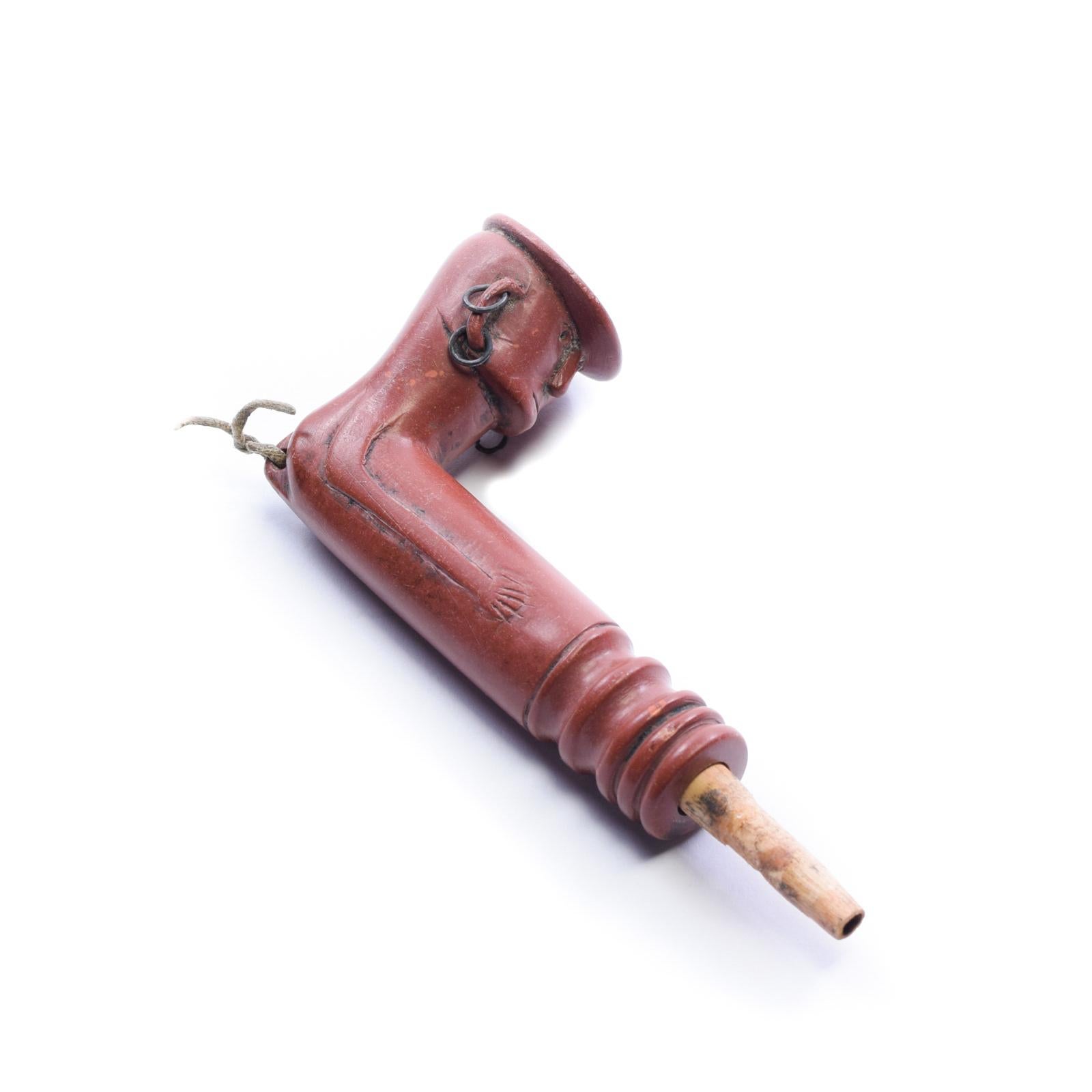 Pawnee/Sioux man figure pipe, with three-piece hand-carved spooled Catlinite stem; over 36