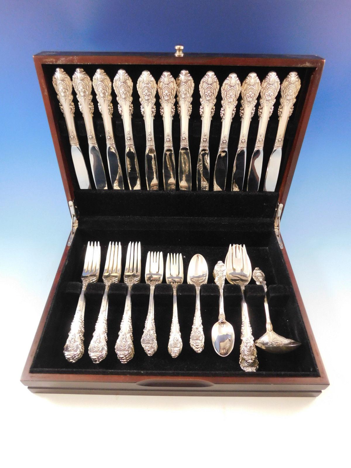 Dinner size Sir Christopher by Wallace Sterling silver flatware set, 51 pieces. This set includes:

12 dinner size knives, 9 3/4