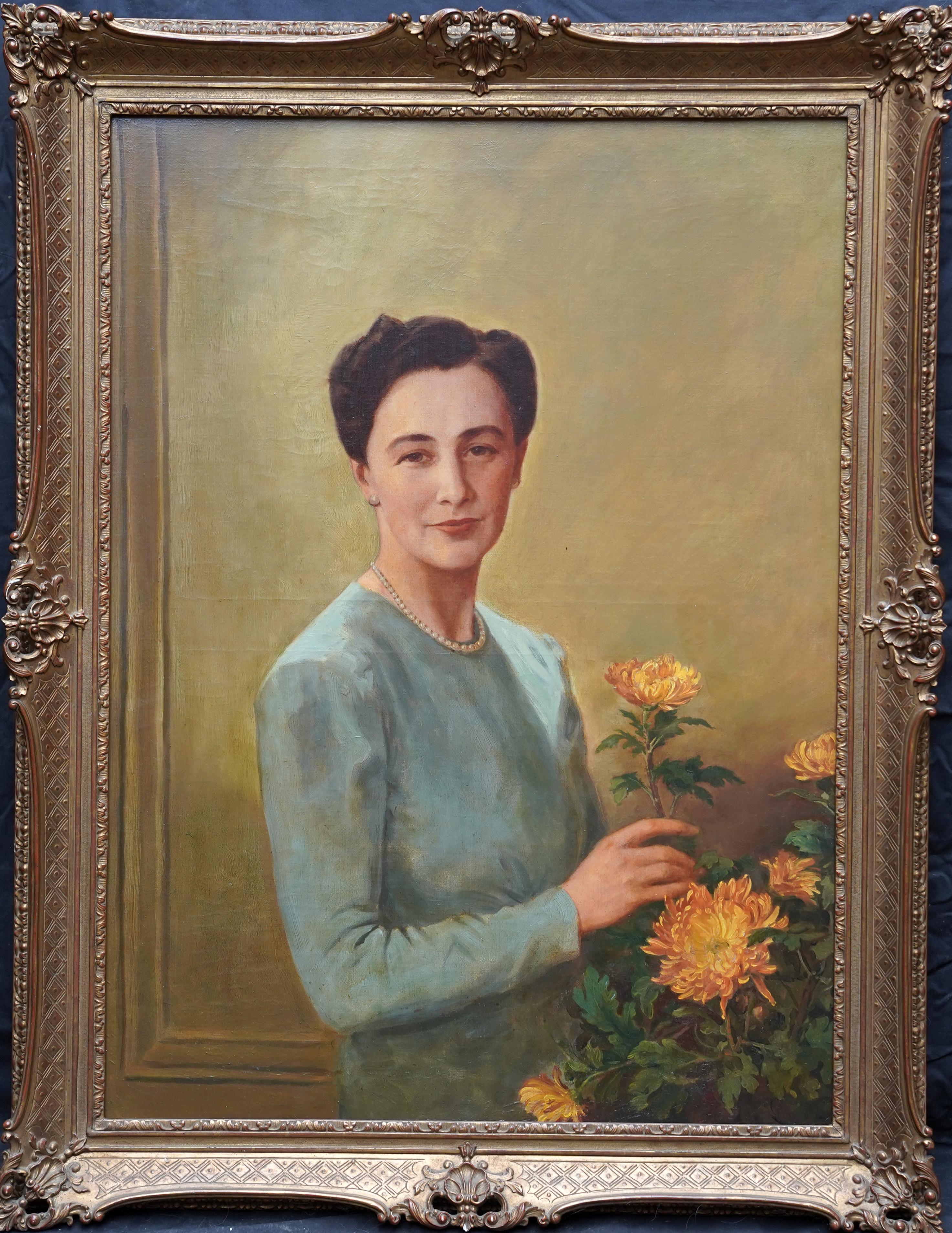 Portrait of a Lady Arranging Flowers - British 1940's art oil painting For Sale 7