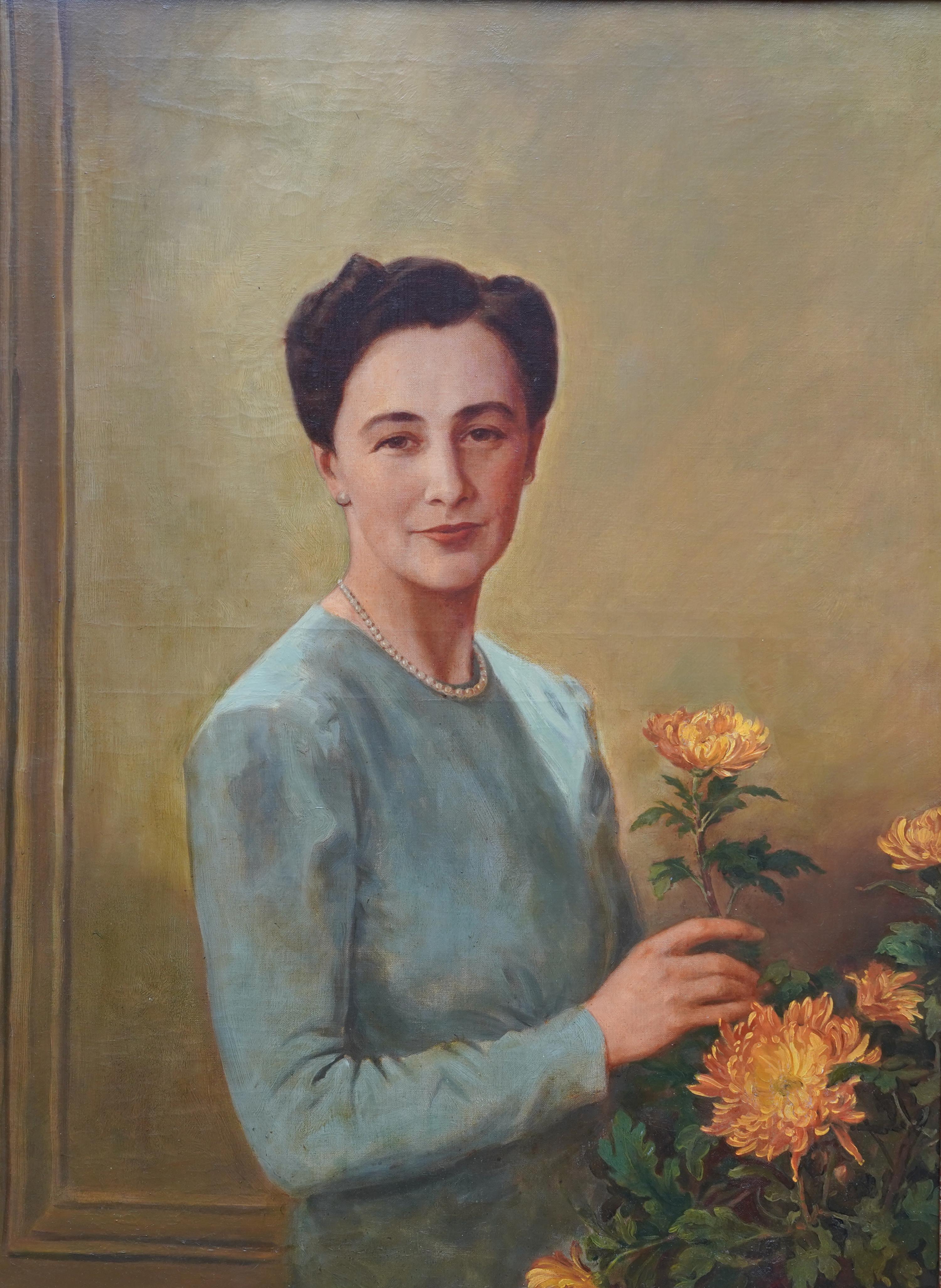 Portrait of a Lady Arranging Flowers - British 1940's art oil painting - Painting by Sir Gerald Festus Kelly